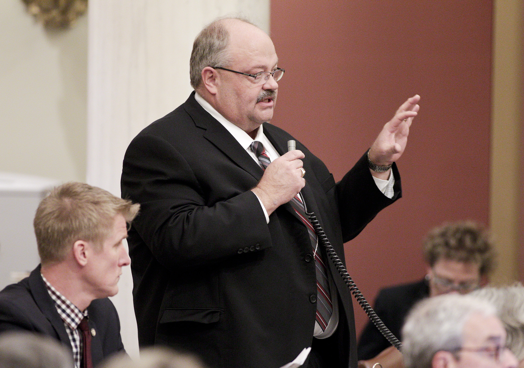 Rep. Greg Davids, chair of the House Taxes Committee, discusses the House federal tax conformity bill during debate on the House Floor Jan. 5. Photo by Paul Battaglia