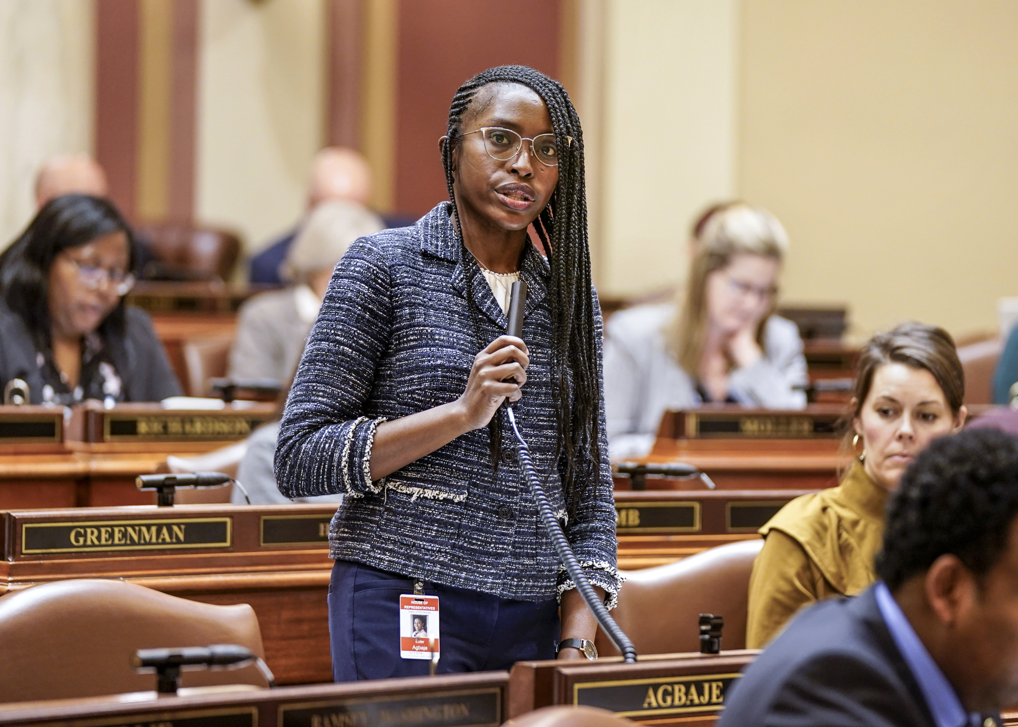 Rep. Esther Agbaje introduces HF37, the CROWN Act, which would prohibit discrimination based on traits associated with race, such as hair texture and hair styles. The bill passed on a 111-19 vote Jan. 11. (Photo by Catherine Davis)