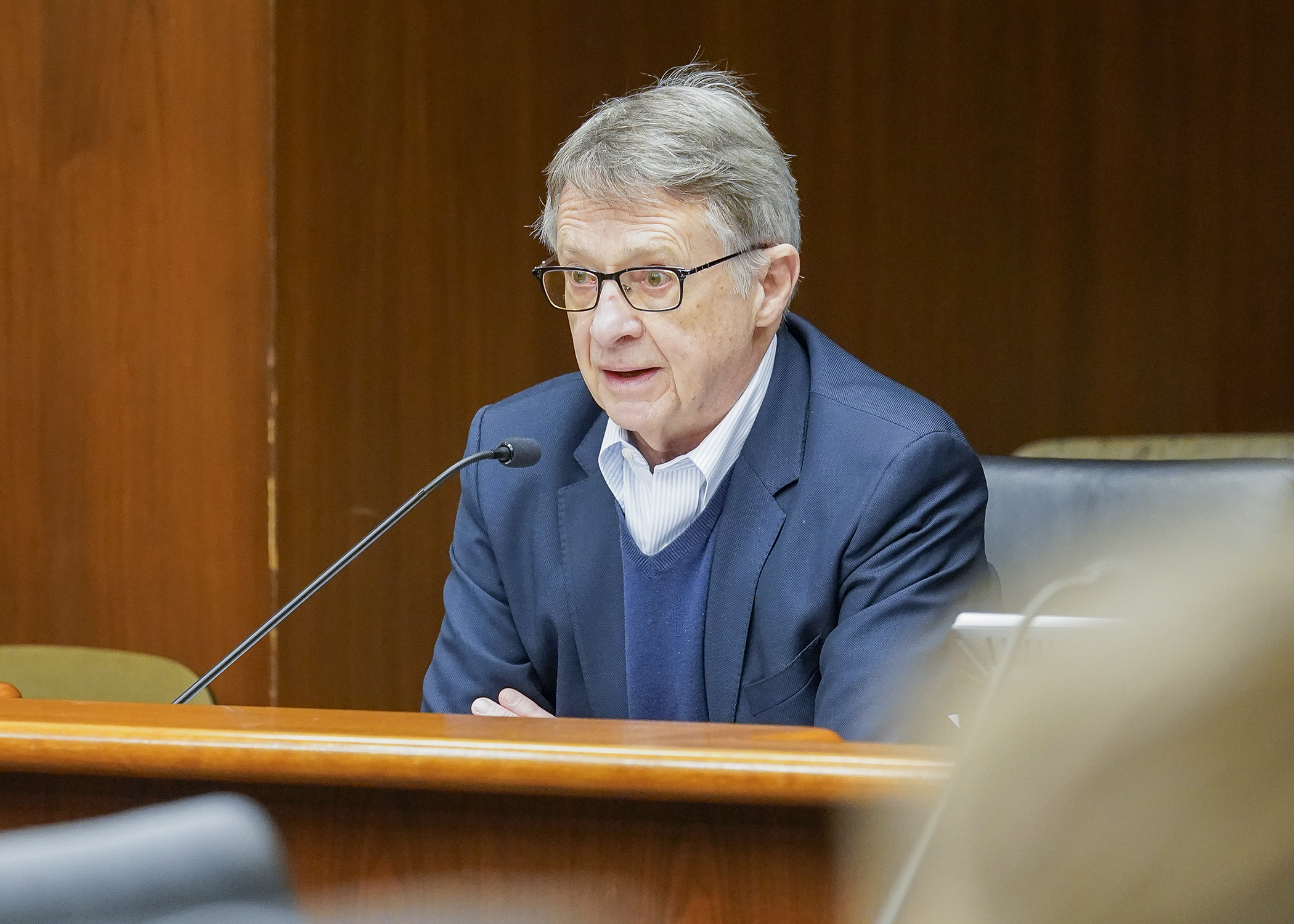 Ken Peterson, a board member at Clean Elections Minnesota, testifies before the House Elections Finance and Policy Committee Jan. 18 in support of a bill to prohibit political activities by foreign-influenced corporations. (Photo by Andrew VonBank)