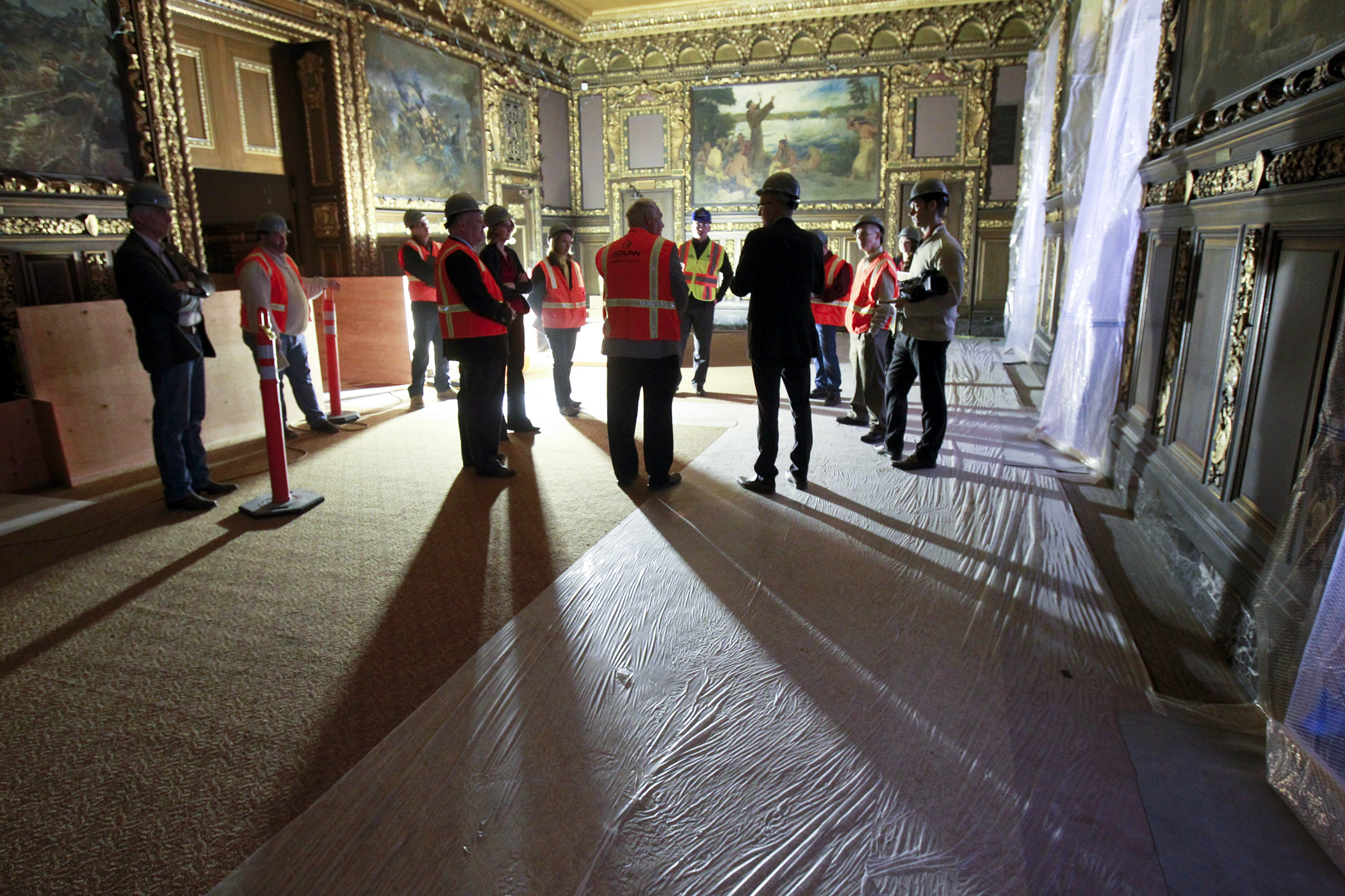 Members and staff of the House State Government Finance Committee stand in the Governor’s Reception Room during a tour of the Capitol restoration work on Jan. 20. Photo by Paul Battaglia