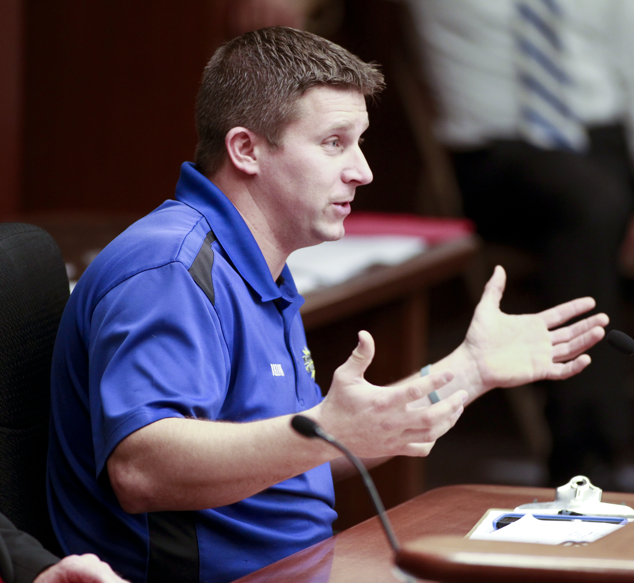 Brian Gilbertson of Lino Lakes, and owner of MagicBounce, Inc., relates his experience dealing with sales and use tax issues to the House Taxes Committee Jan. 21. Photo by Paul Battaglia
