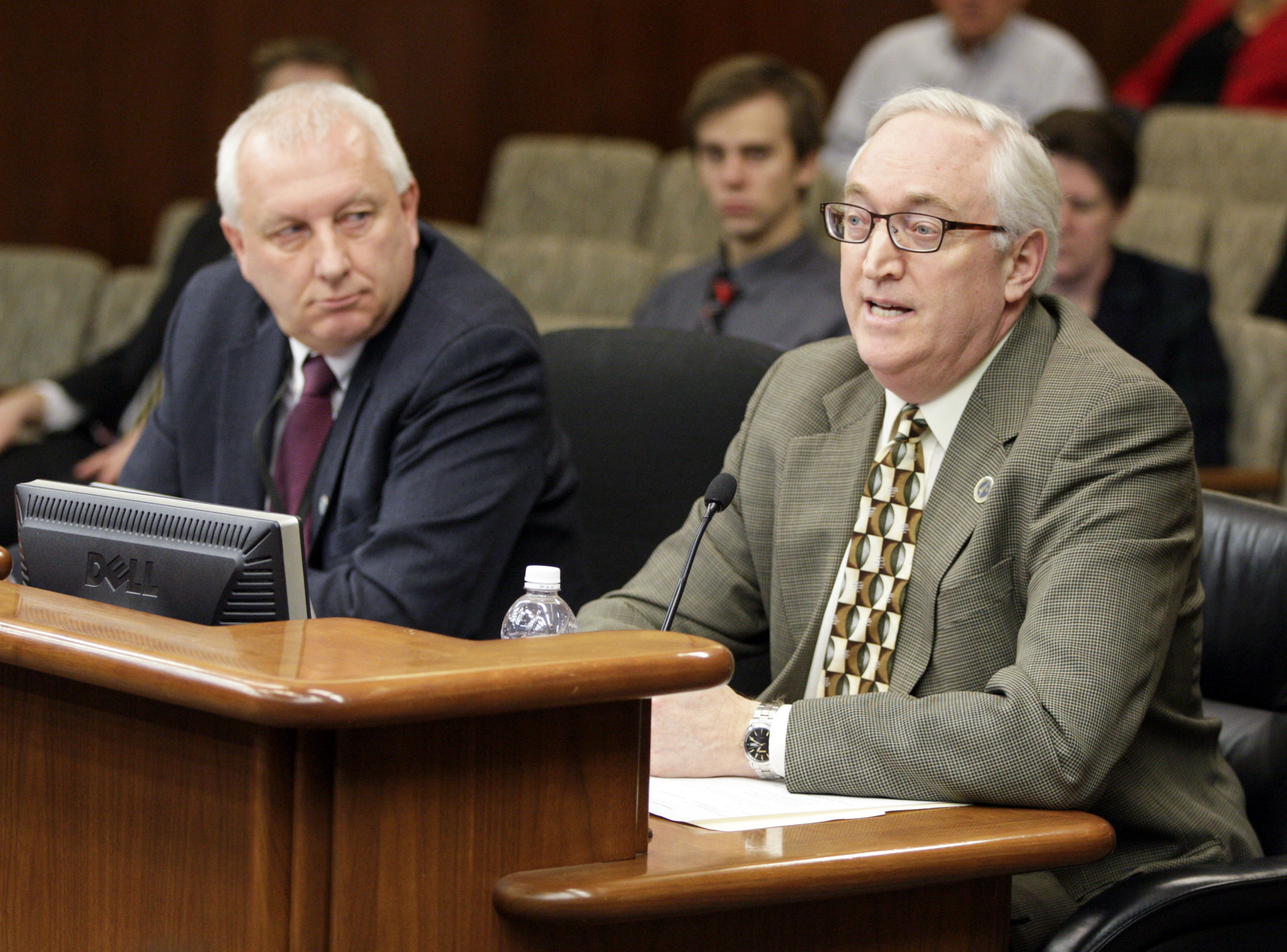 Bill Gardner, director of MnDOT’s Freight Planning Office, right, and MnDOT Rail Planner Dave Christianson give the House Transportation Policy and Finance Committee an overview on rail safety in Minnesota Jan. 21. Photo by Paul Battaglia