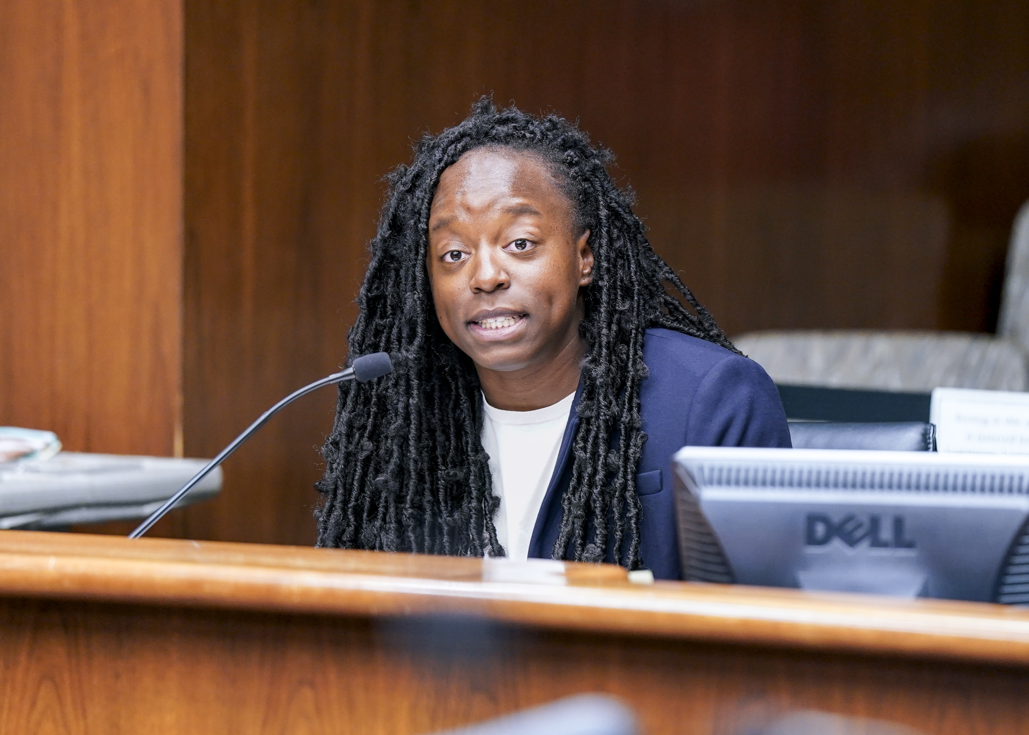 Temi Ogunrinde, equity and engagement director at Urban Homeworks, testifies before the House Housing Finance and Policy Committee Jan. 31 in support of HF685 that would prevent corporations from buying single-family houses. (Photo by Catherine Davis)