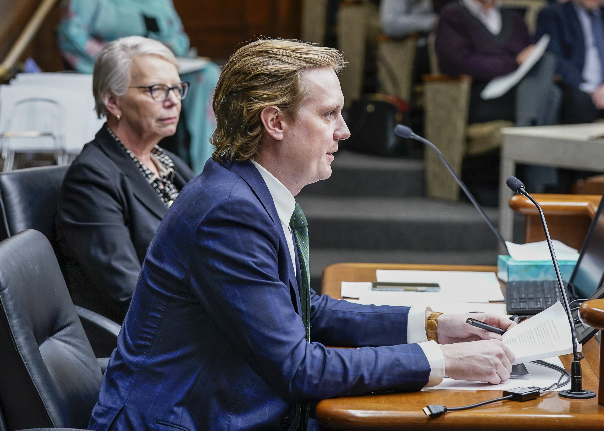 Braden Solum, vice president for business development at iDEAL Energies, testifies Feb. 1 in support of HF747, which would establish grants for solar panels on public buildings. (Photo by Catherine Davis)