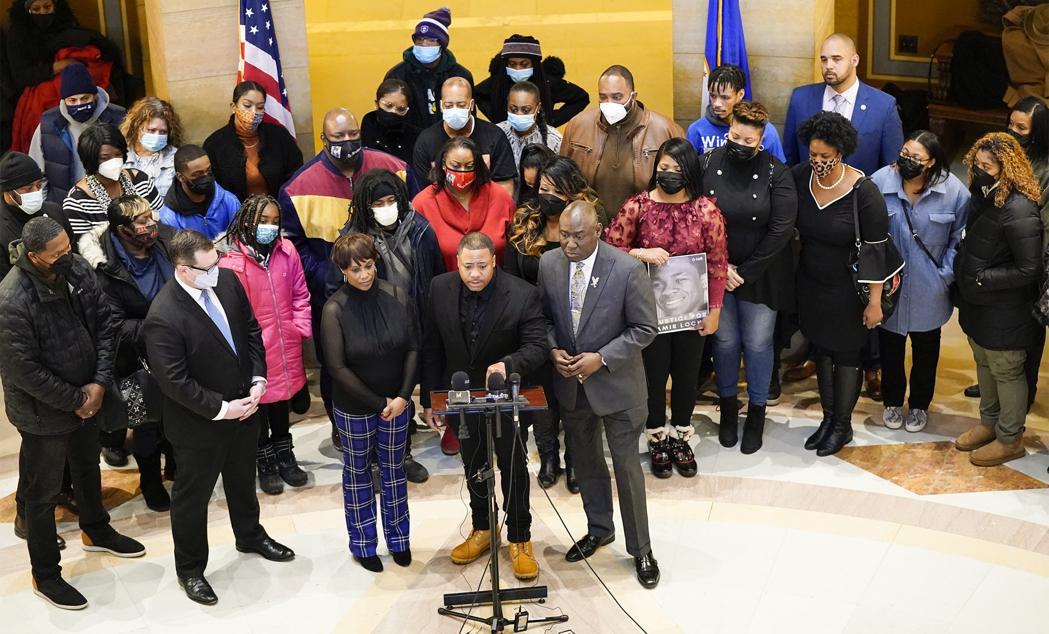 Andre Locke, father of Amir Locke, speaks at a Feb. 10 Capitol press conference demanding a ban on no-knock search warrants. Also pictured are Amir’s mother, Karen Wells, and attorney Ben Crump. (Photo by Paul Battaglia)