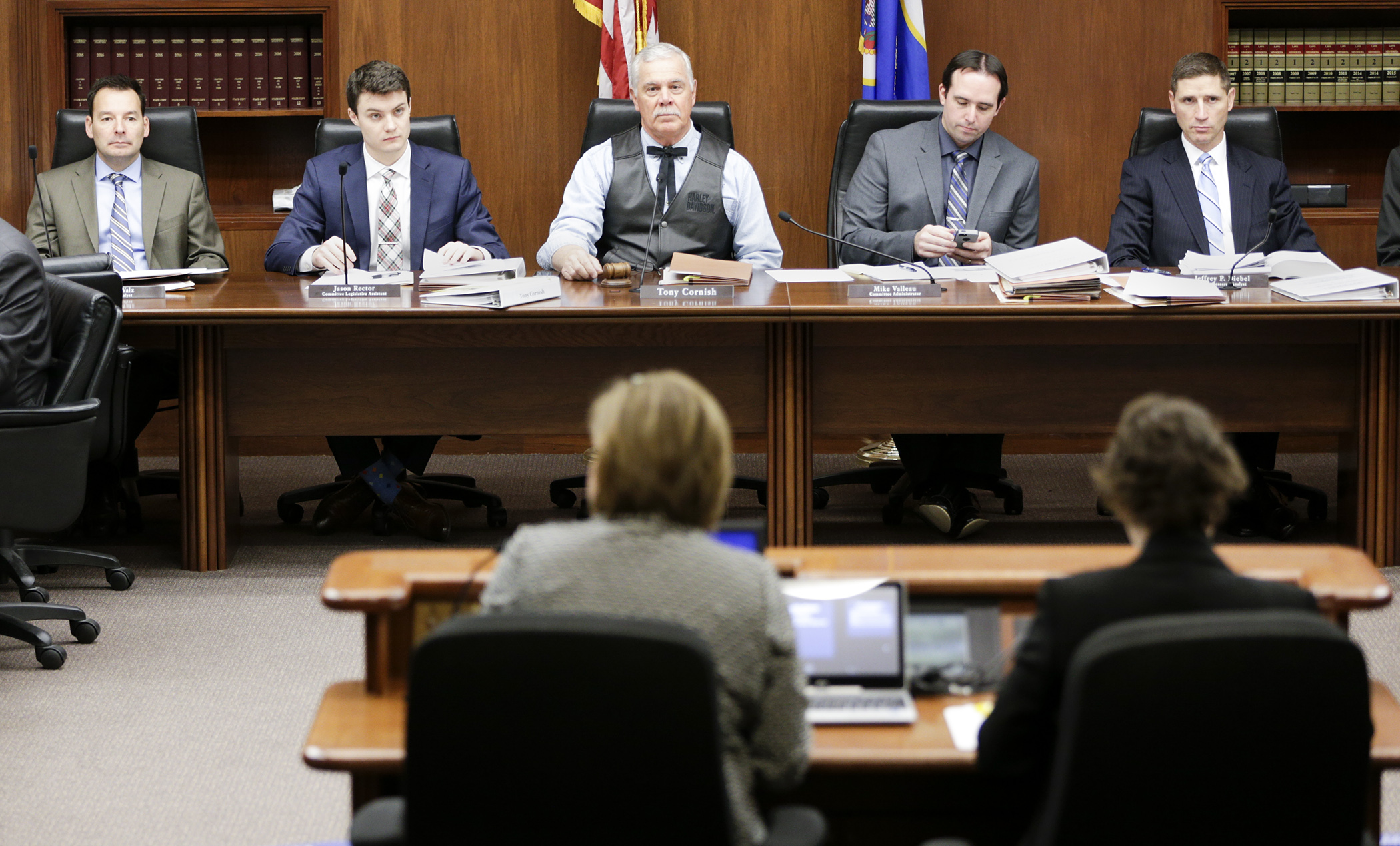 Rep. Tony Cornish, the committee chair, and other members and staff of the House Public Safety and Security Policy and Finance Committee, listen as Commissioner Mona Dohman presents the Public Safety Department’s biennial budget request to the committee Feb. 14. Photo by Paul Battaglia