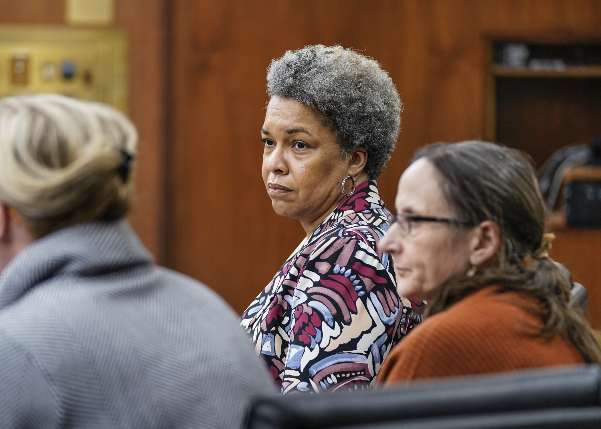Artika Roller, executive director at Minnesota Coalition Against Sexual Assault, offers testimony to the House's labor and industry committee in support of HF1056, a bill to prohibit abuse settlements from being labeled severance. (Photo by Catherine Davis)