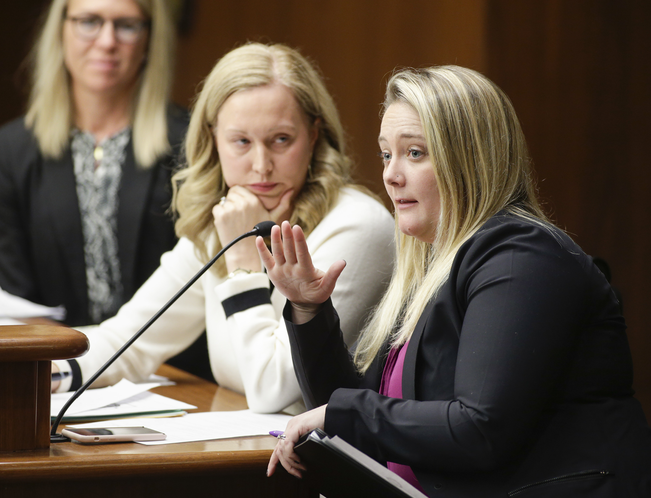 Lisa Smith, a health and physical education teacher at Lakeville South High School, testifies on HF3166, sponsored by Rep. Heather Edelson, left, during the House Education Policy Committee Feb. 18. Photo by Paul Battaglia