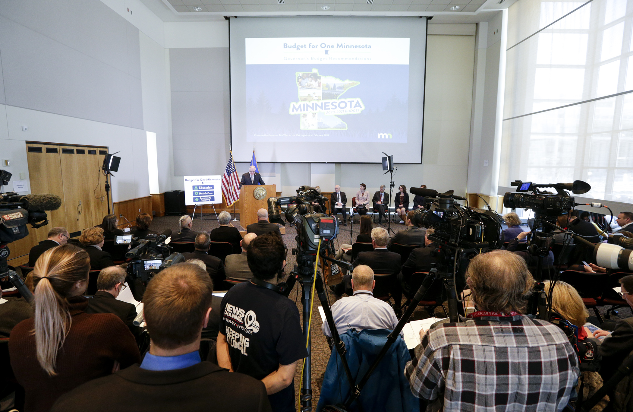 Gov. Tim Walz unveils his proposed 2020-21 budget before the gathered media during a news conference Feb. 19. Photo by Paul Battaglia
