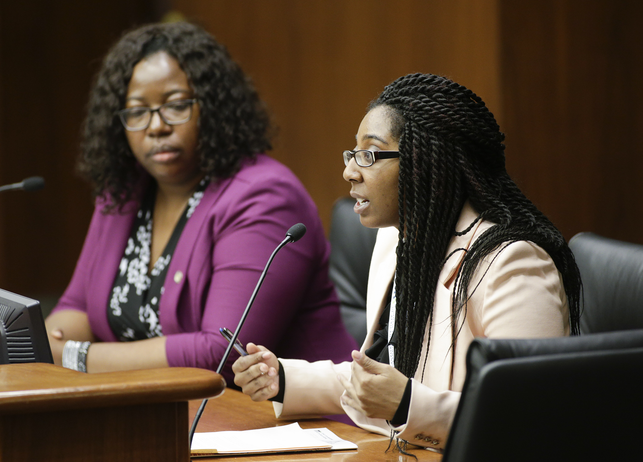 Jasmine Carey, of the Council for Minnesotans of African Heritage, testifies in the House Education Policy Committee on HF987, sponsored by Rep. Ruth Richardson, left. Photo by Paul Battaglia