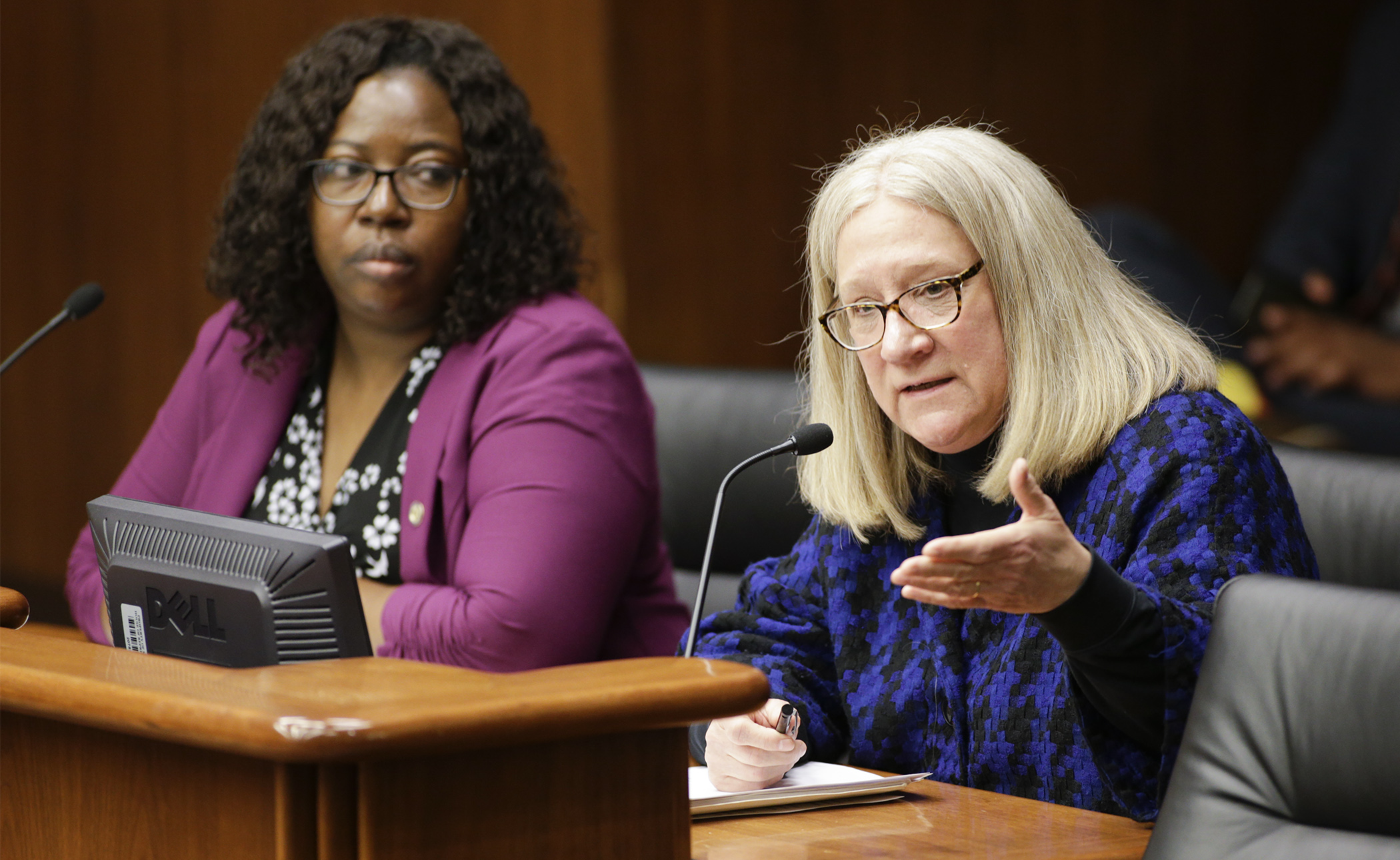 Sue Abderholden, executive director of the National Alliance on Mental Illness Minnesota, speaks about HF813, sponsored by Rep. Ruth Richardson, left, to fund student suicide and mental health awareness training for teachers. Photo by Paul Battaglia