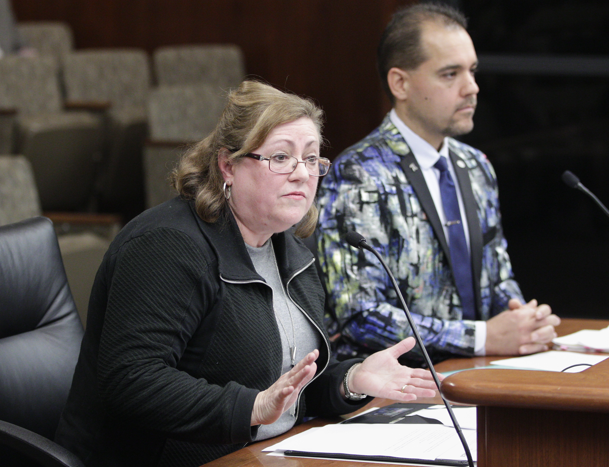 Linda Bell testifies in the House Judiciary Finance and Civil Law Division on HF1821, sponsored by Rep. Eric Lucero, right, which would create the Student Data Privacy Act. Photo by Paul Battaglia