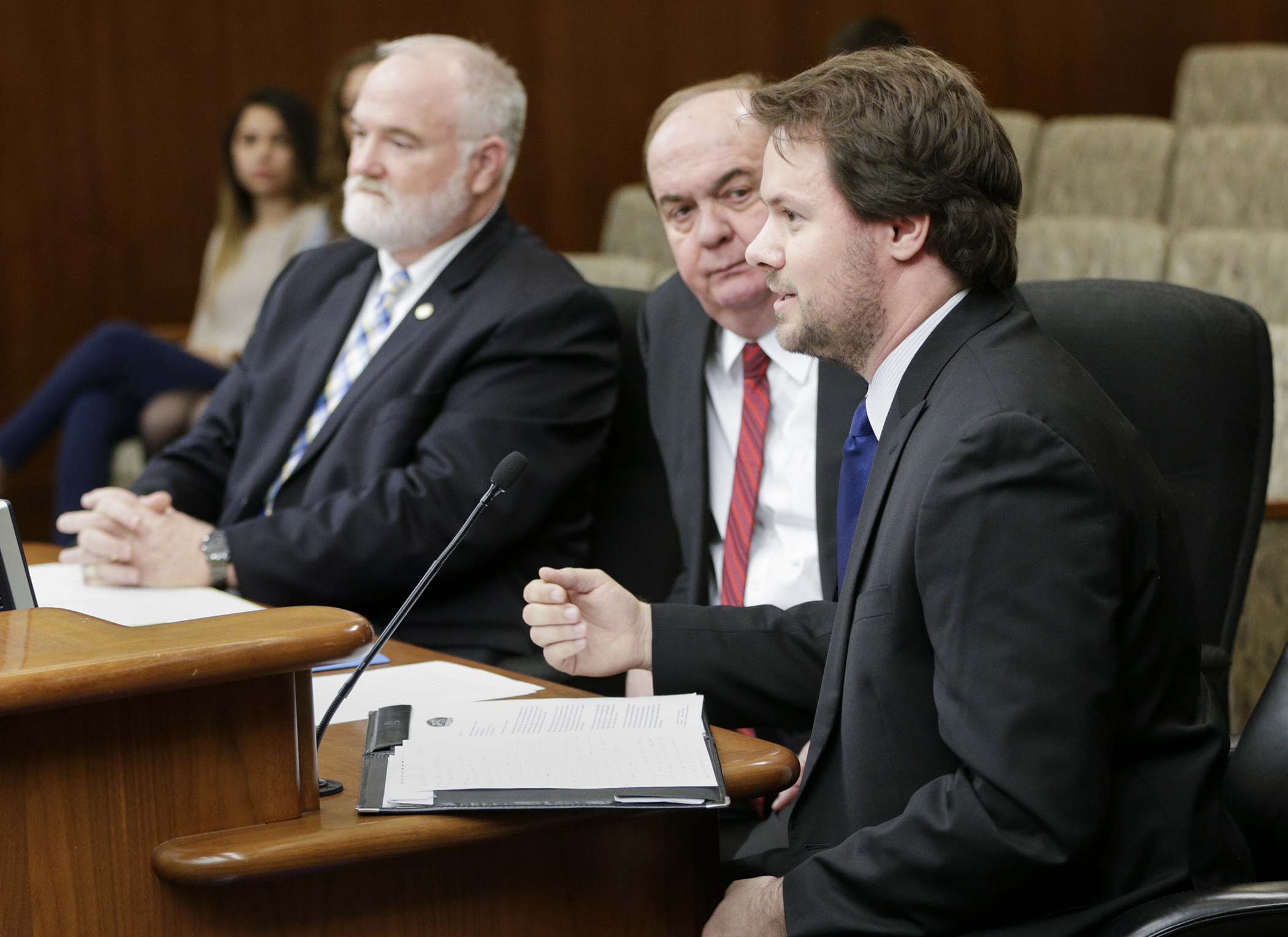 Andrew Offerman, director of racing operations at Canterbury Park, testifies in favor of HF1010, sponsored by Rep. Bob Loonan, left, during the House State Government Finance Committee Feb. 22. The bill would include funding for ongoing operations of the Minnesota Racing Commission if a budget is not enacted before the start of the fiscal biennium. Photo by Paul Battaglia