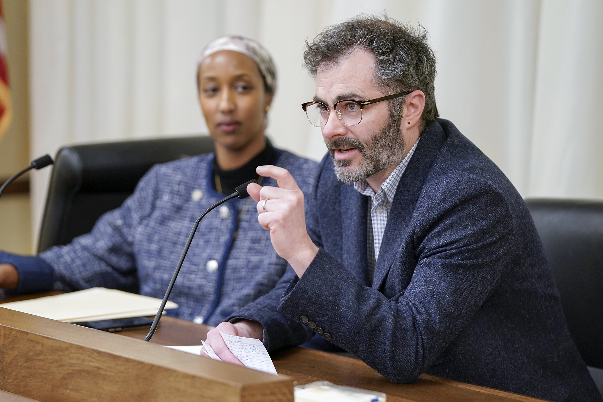 Dr. Ryan Kelly testifies Feb. 23 before the House Health Finance and Policy Committee in support of HF3444 that would prohibit prior authorization for opioid use disorder treatment. The bill is sponsored by Rep. Anquam Mahamoud. (Photo by Michele Jokinen)