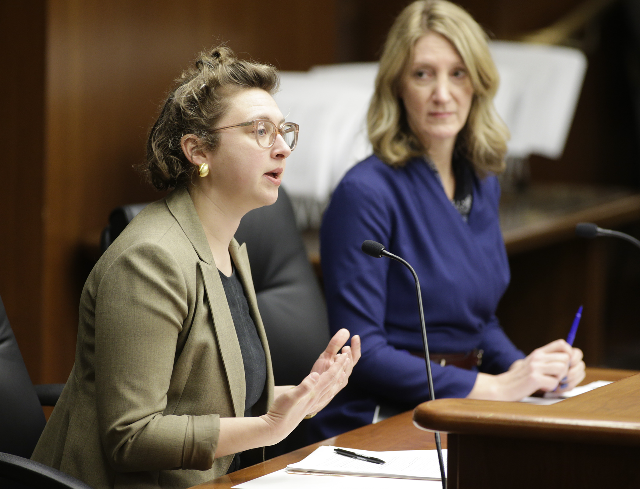 Clark Goldenrod, deputy director of the Minnesota Budget Project, testifies Feb. 24 before the House Ways and Means Committee on HF150, sponsored by Rep. Jennifer Schultz, right. Photo by Paul Battaglia