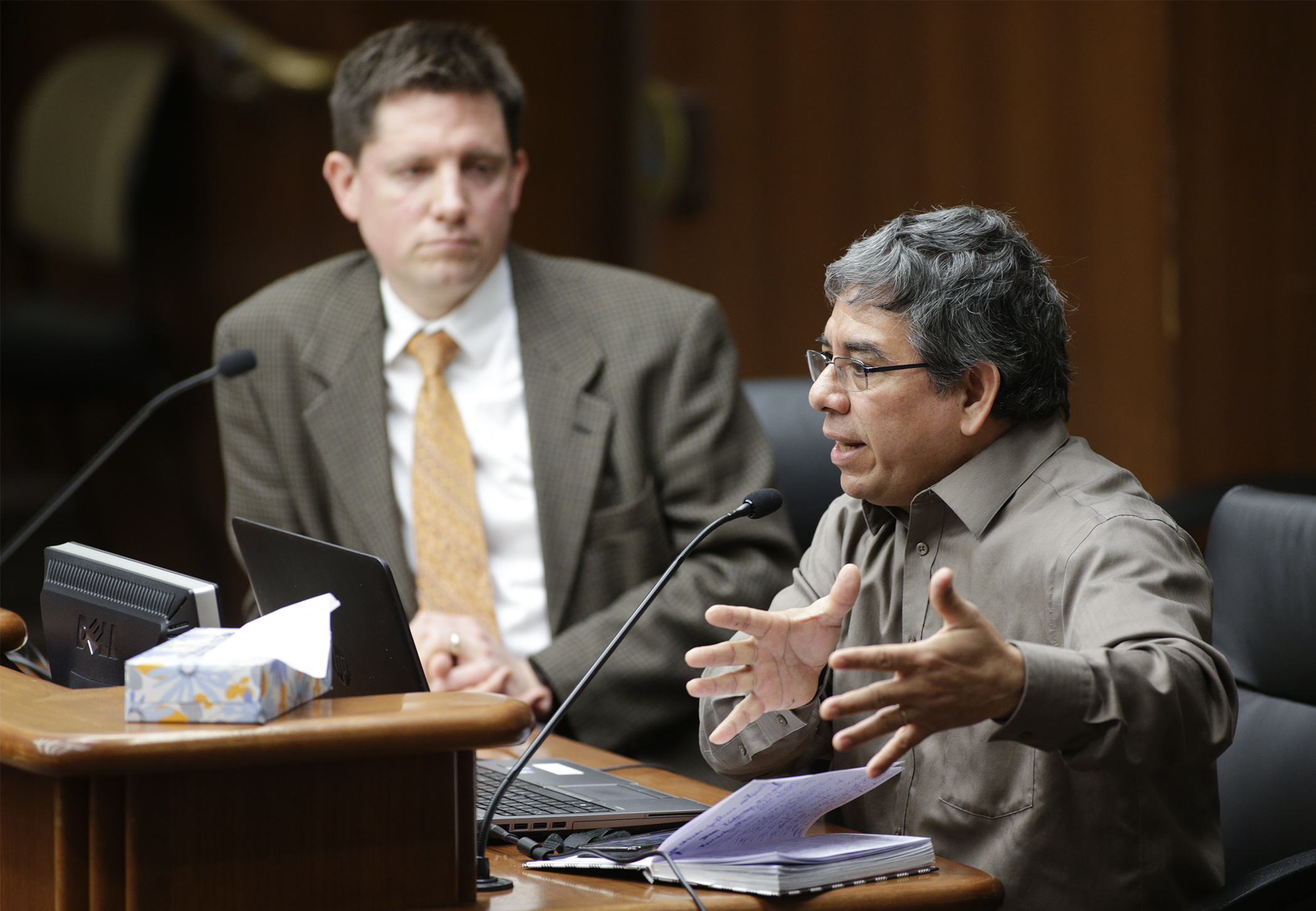 Reginaldo Haslett-Marroquin, CEO of Regenerative Agriculture Alliance, testifies before the House's agriculture division Feb. 25 on HF3420, sponsored by Rep. Todd Lippert, left. Photo by Paul Battaglia