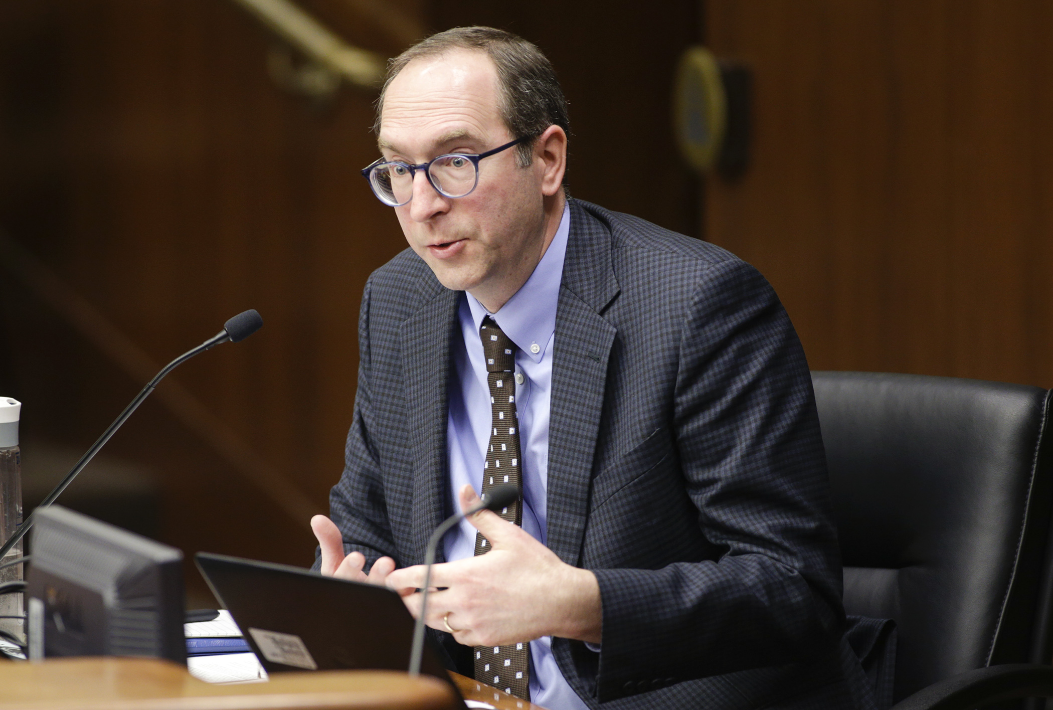 Eric Willette, director of tax research at the Department of Revenue, provides a presentation of the Tax Expenditure Budget to the House Taxes Committee Feb. 25. Photo by Paul Battaglia