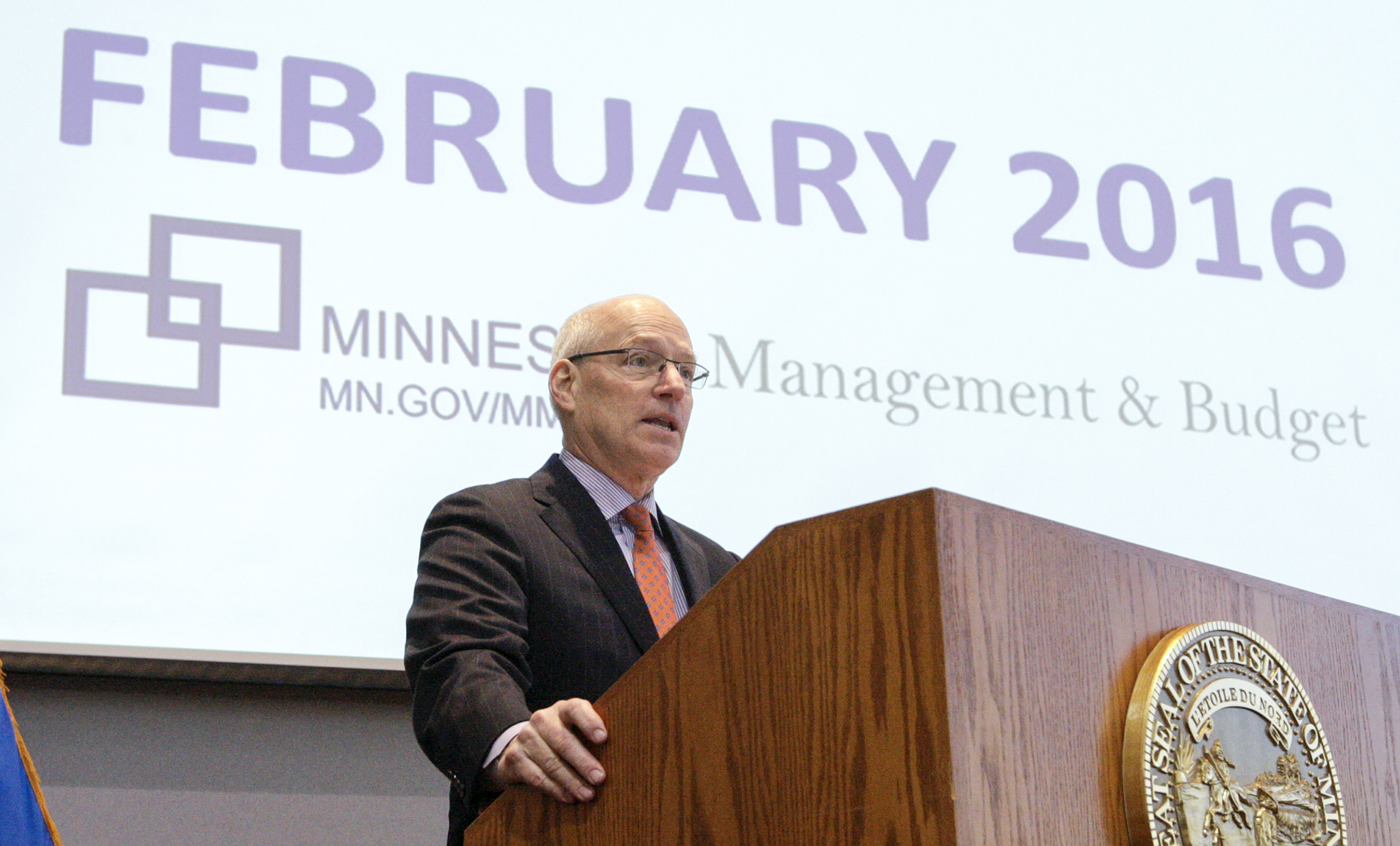 Minnesota Management & Budget Commissioner Myron Frans presents Minnesota’s Budget and Economic Forecast Friday. The state is projected to have a $900 million surplus at the end of the 2016-2017 biennium. Photo by Paul Battaglia