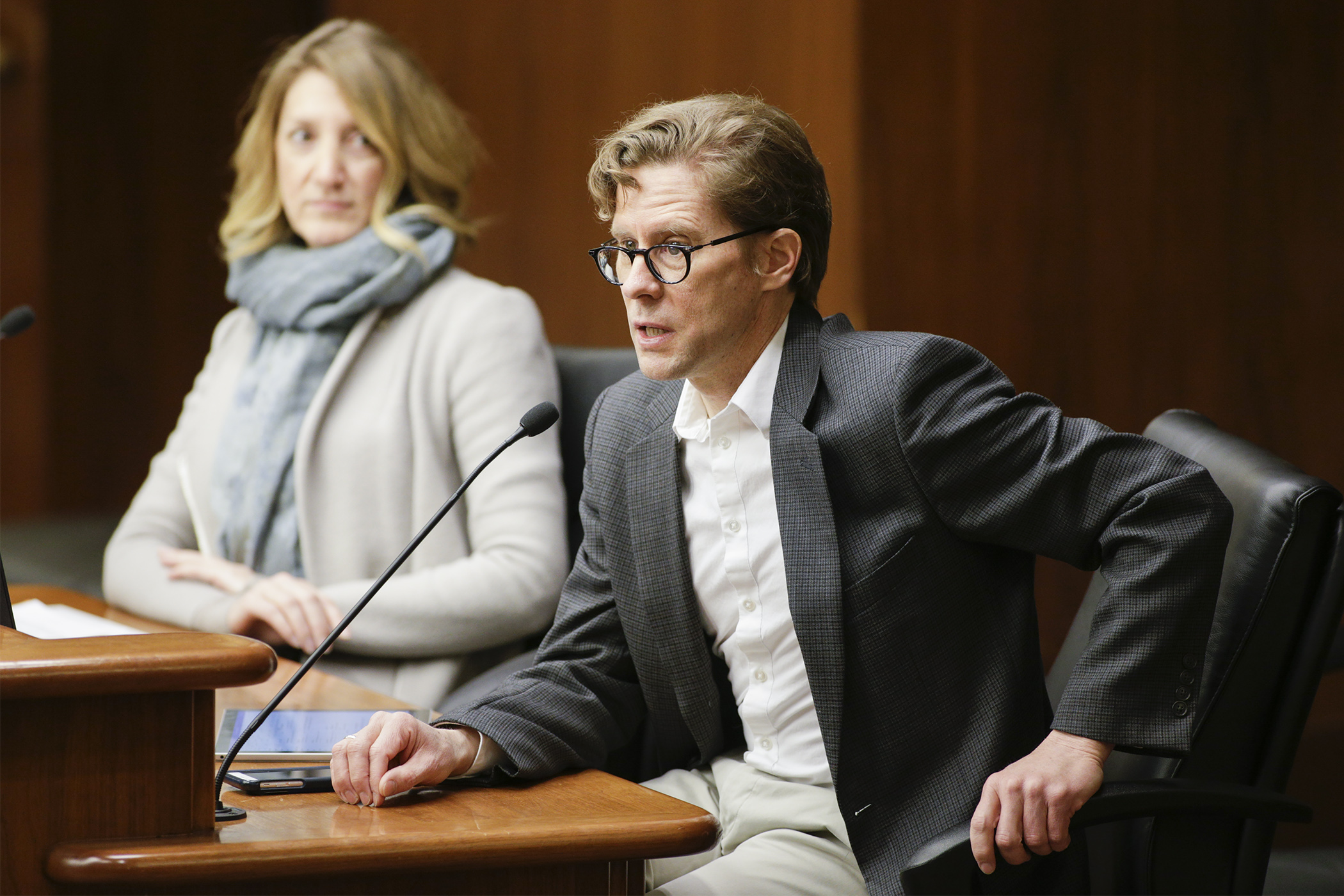 HOURCAR CEO Paul Schroeder answers a question from the House Taxes Committee on HF1357 which would, in part, exempt car-sharing services from certain taxes. Rep. Jennifer Schultz, left, sponsors the bill. Photo by Paul Battaglia