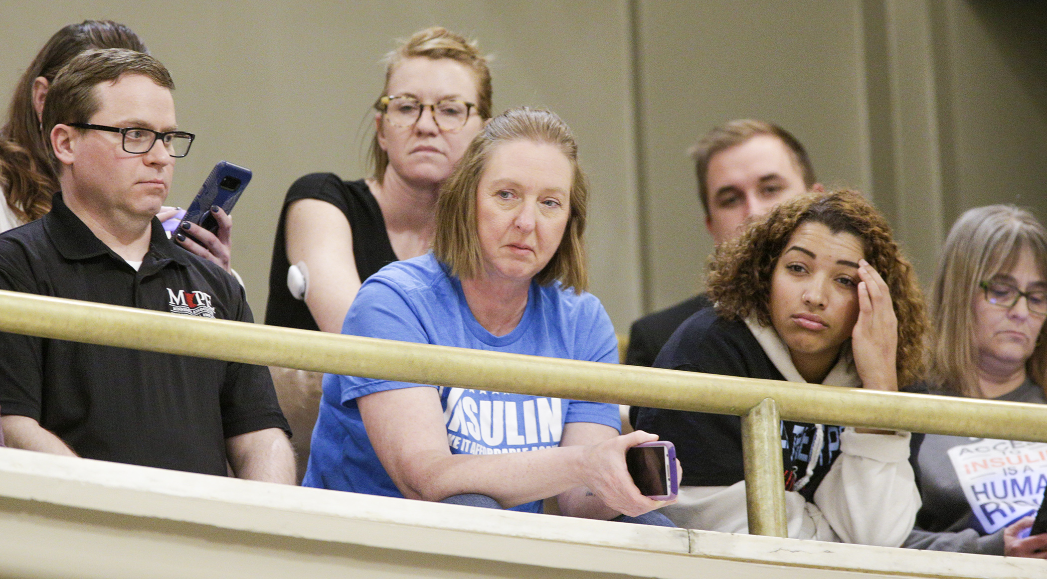 Nicole Smith-Holt listens to Feb. 26 debate from the House Gallery on HF3100, which would establish an emergency insulin program. Smith’s son, Alec, died in 2017 from diabetic ketoacidosis. Photo by Paul Battaglia