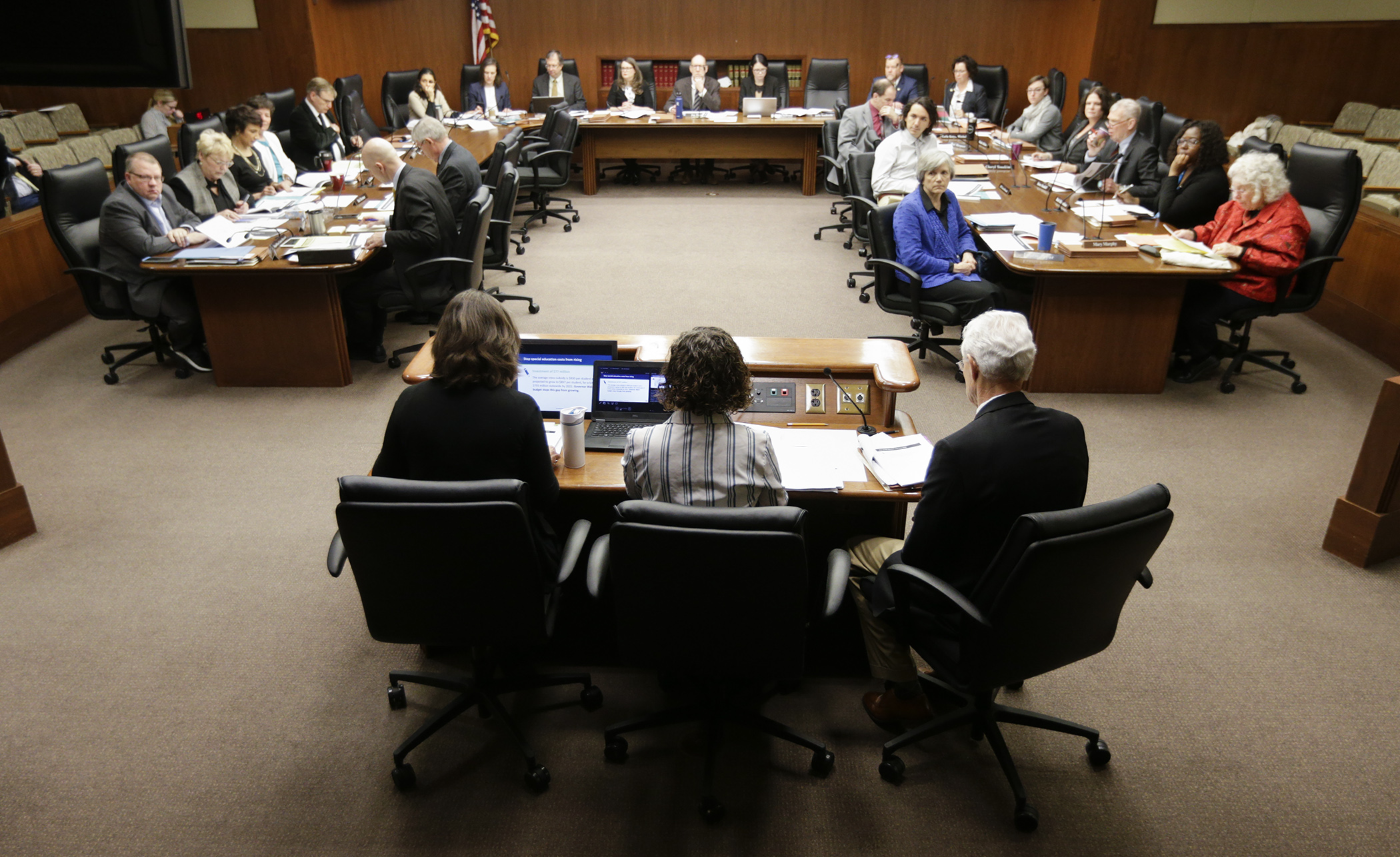 Members of the House Education Finance Division listen Feb. 27 as Education Commissioner Mary Cathryn Ricker outlines the governor’s budget request for the department. Photo by Paul Battaglia