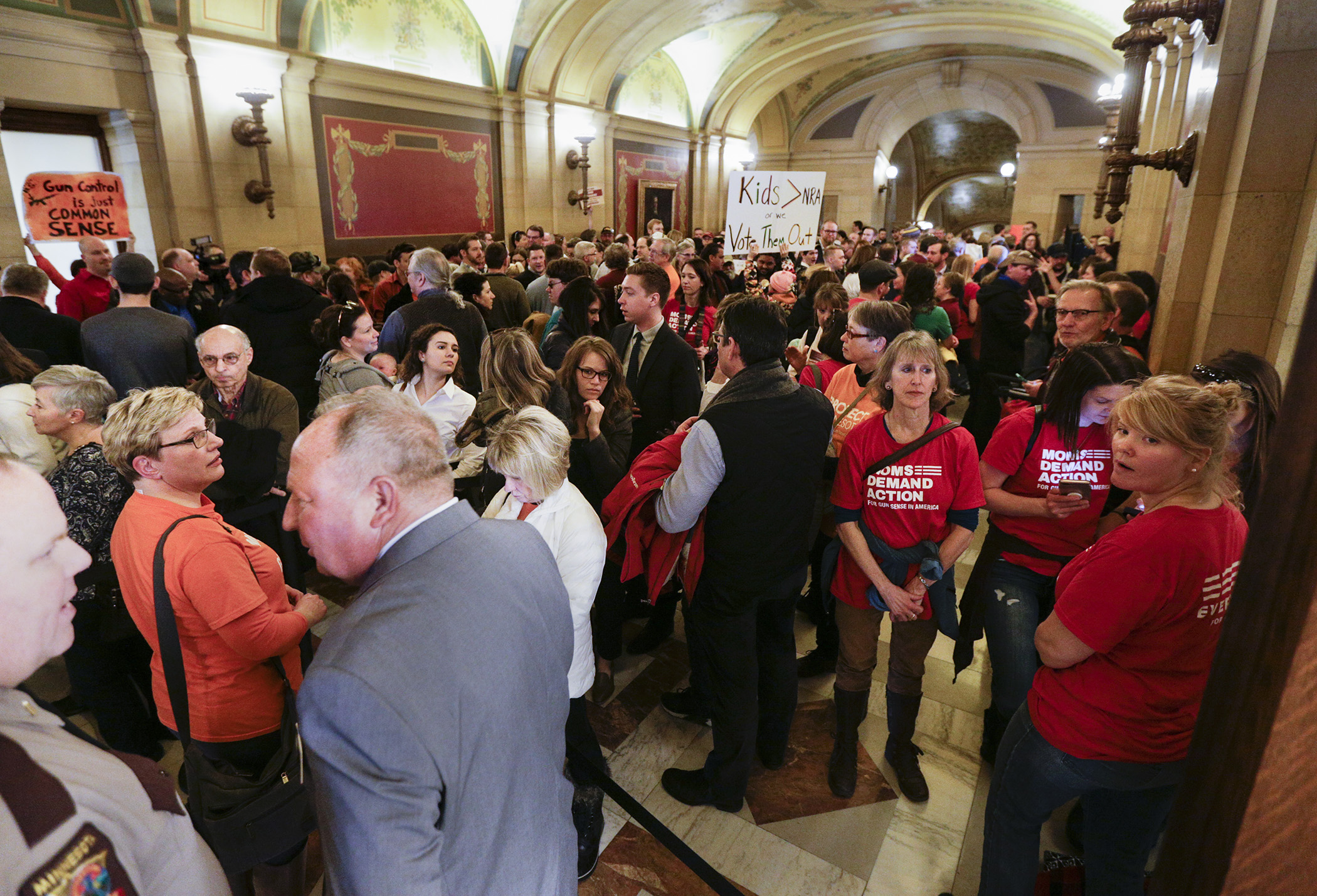 Hundreds of people filled the Capitol Corridor outside a March 1 hearing of the House Public Safety and Security Policy and Finance Committee where two gun-related bills were heard. Photo by Paul Battaglia