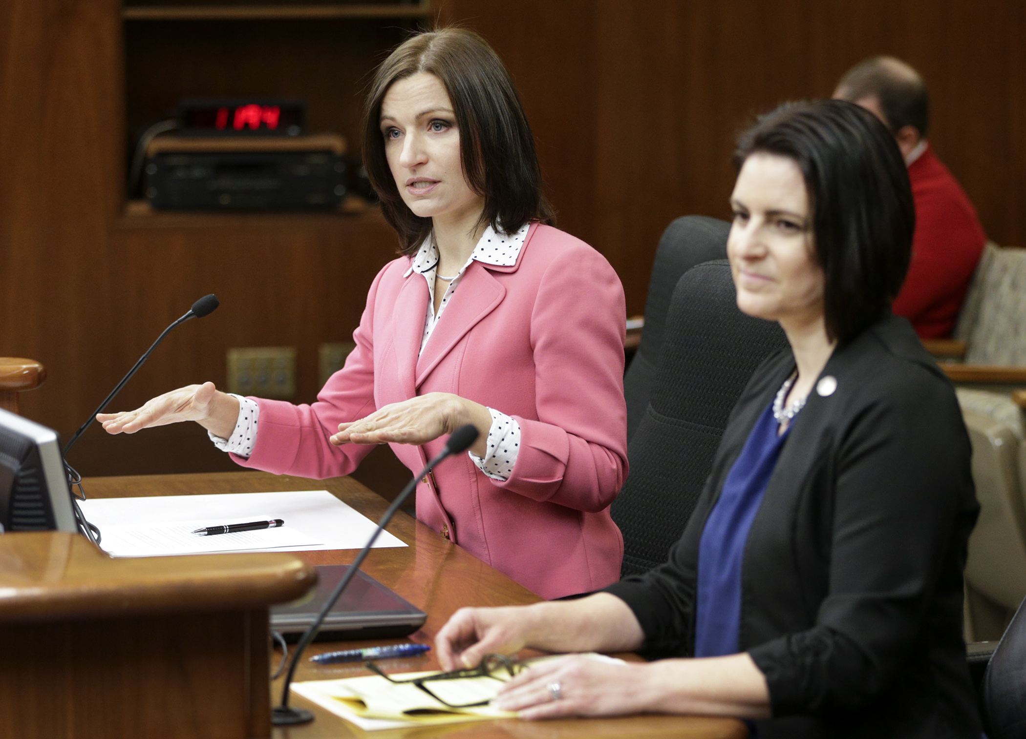 Lilia Panteleeva, executive director of the Children’s Law Center of Minnesota, answers a question about HF1252, sponsored by Rep. Marion O’Neill, right, that would provide grant funding to provide legal services for foster children. Photo by Paul Battaglia