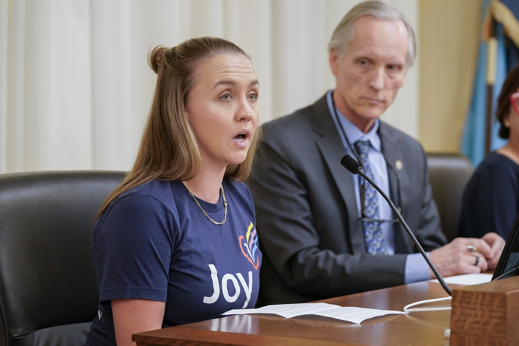 Annunciation Catholic School parent Kacie Sharpe testifies before the House health committee March 2 in support of HF3668. Sponsored by Rep. Robert Bierman, the bill would establish an Office of Gun Violence Prevention. (Photo by Michele Jokinen)
