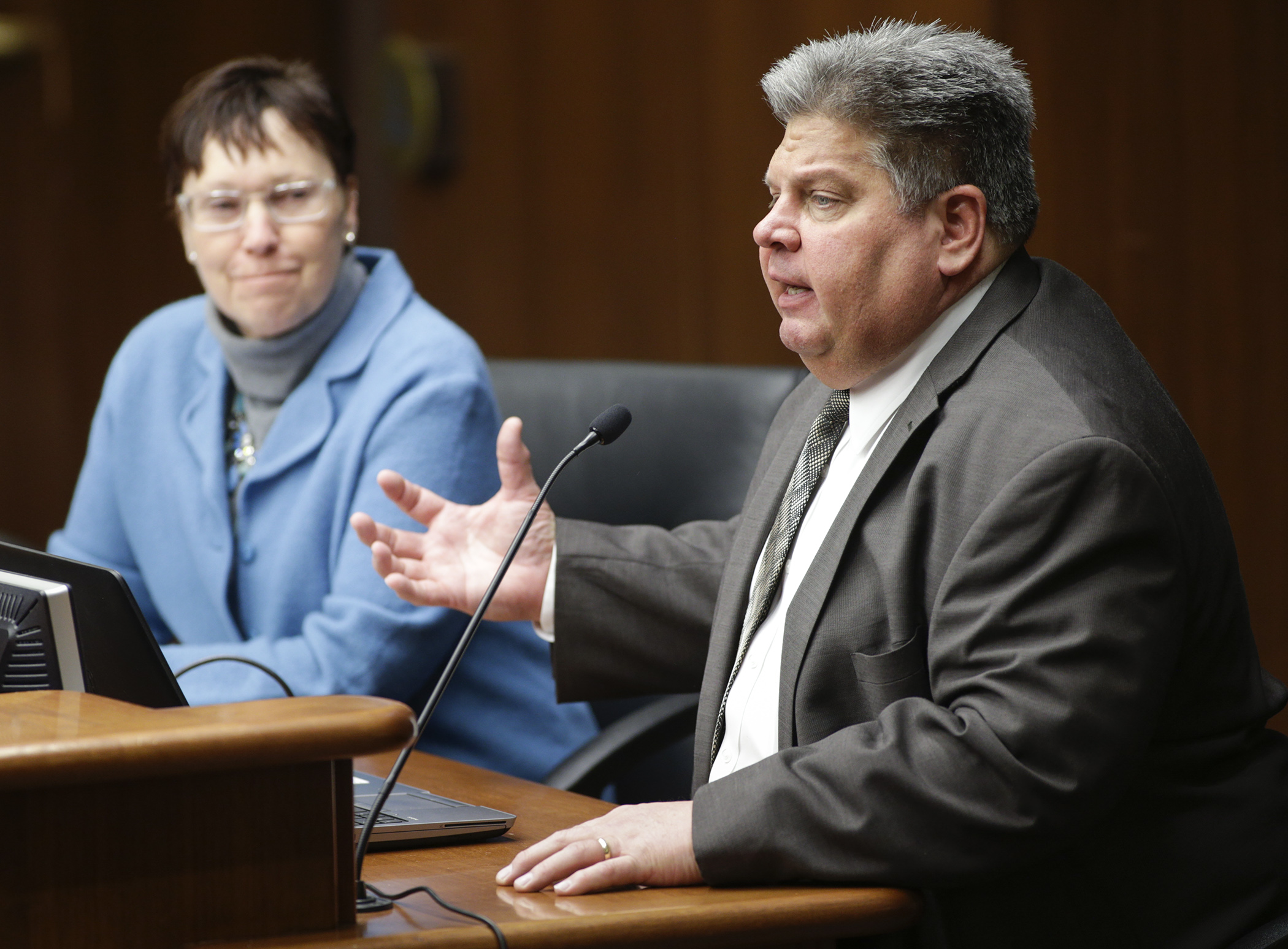 Minnesota Farm Bureau President Kevin Paap testifies March 3 on HF3699, sponsored by Rep. Jeanne Poppe, left. The bill would increase the minimum biofuel content in gasoline to 15 percent. Photo by Paul Battaglia