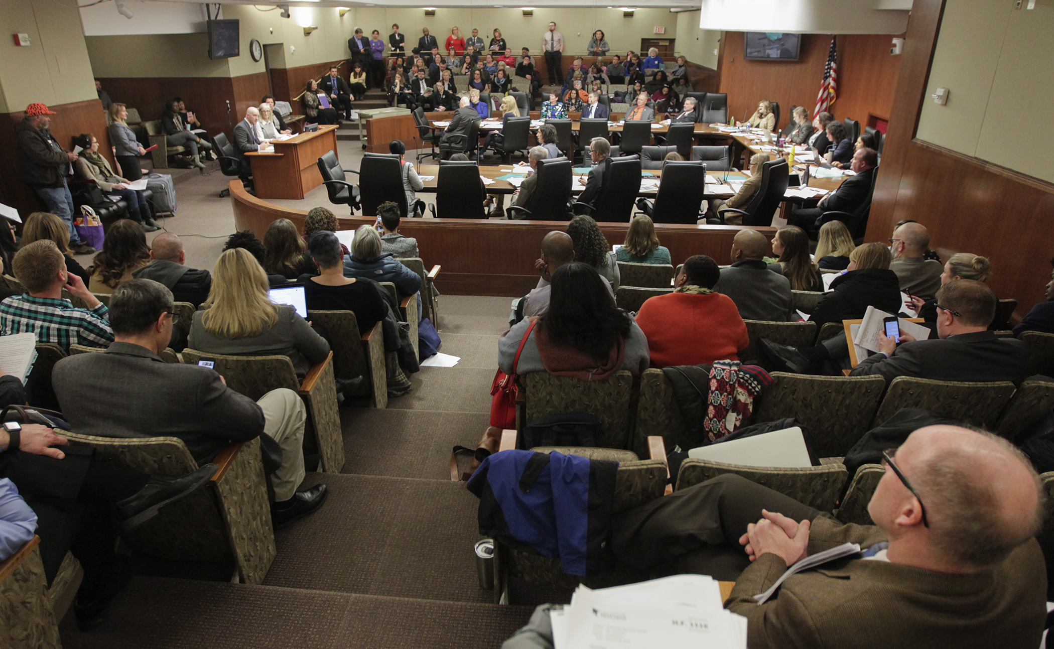 A crowded room listens to testimony in the House Education Policy Committee on HF1329, sponsored by Rep. Mary Kunesh-Podein, which would modify teacher licensure requirements and mentorship requirements. Photo by Paul Battaglia