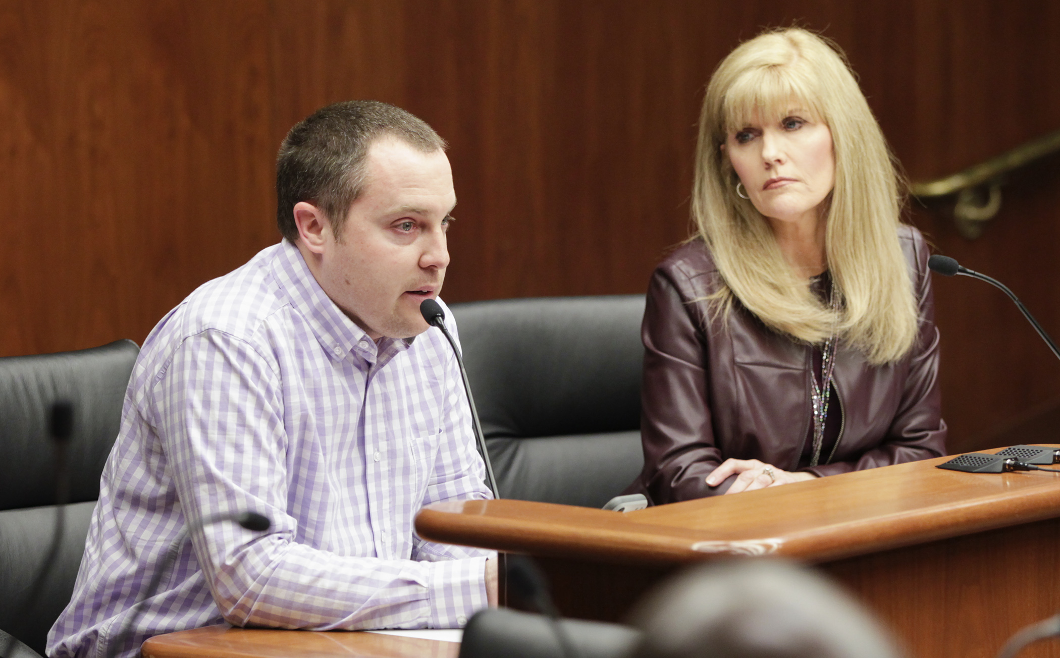 Jacob Quade testifies in the House Judiciary Finance and Civil Law Division on HF1666, sponsored by Rep. Peggy Scott, right, which would change the parenting time presumptions in cases of child custody. Photo by Paul Battaglia