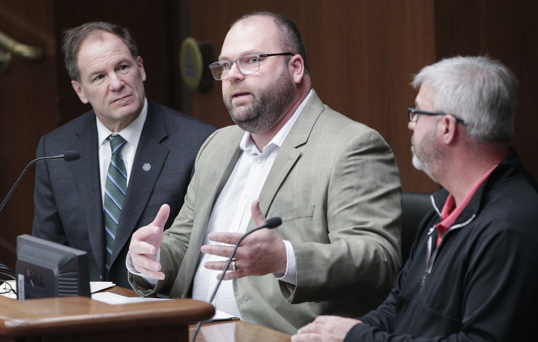 Kevin Poppel testifies March 5 before the House Taxes Committee in support of HF3882. Sponsored by Rep. Paul Marquart, left, the bill would provide full, retroactive conformity to Section 179 of the federal tax code. Photo by Paul Battaglia