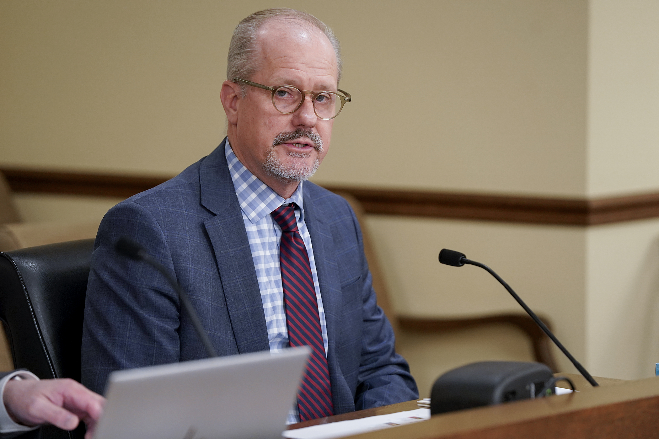 Michael Fritz, chief judge of the Seventh Judicial District, testifies March 5 before the House Judiciary Finance and Civil Law Committee in support of a supplemental funding bill for the state’s judicial branch. (Photo by Michele Jokinen)