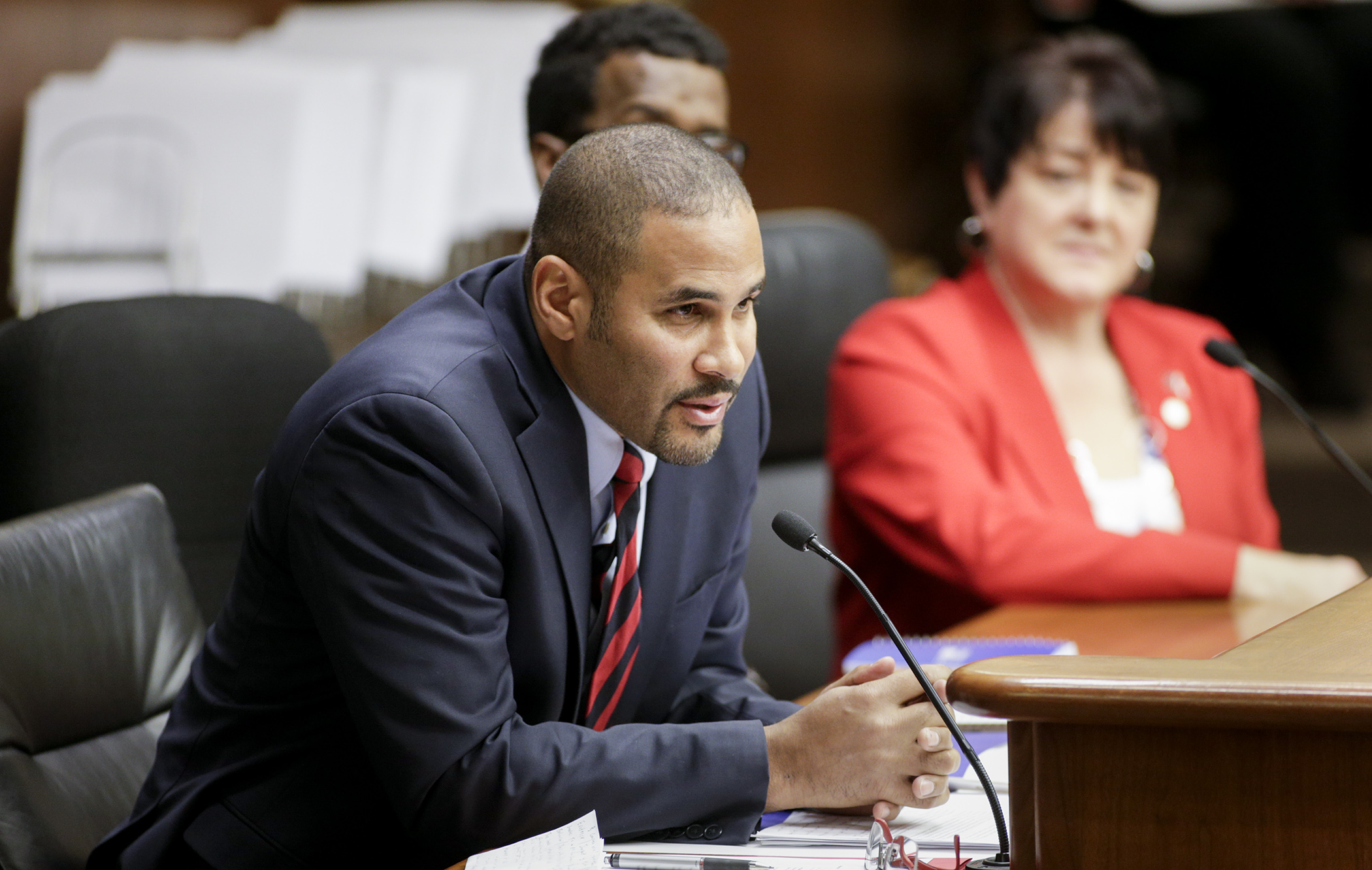 Tony Sanneh, CEO of the Sanneh Foundation, testifies March 7, in favor of HF268, sponsored by Rep. Tama Theis, which would authorize grants to the foundation to provide all-day, in-school, and after-school academic and behavioral interventions for low-performing and chronically absent students. Photo by Paul Battaglia