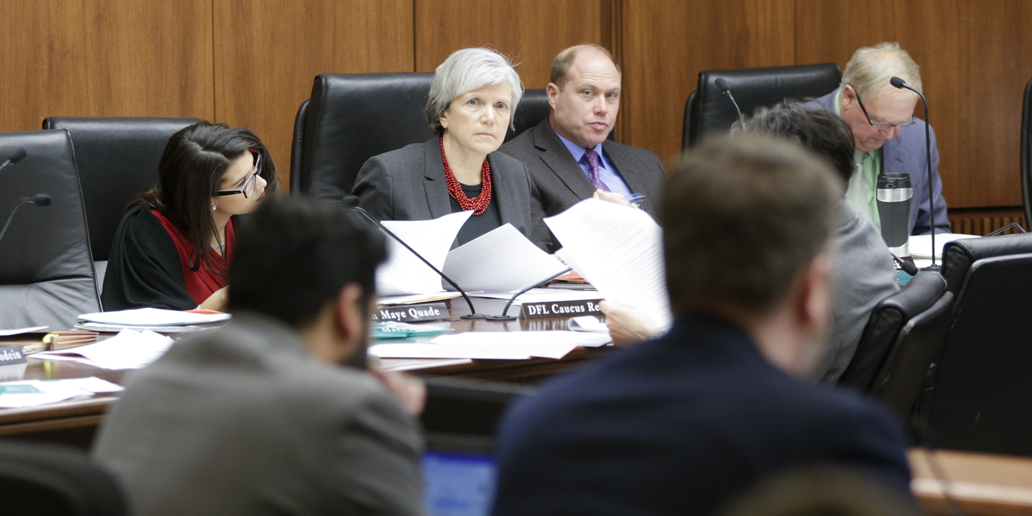 Members of the House Education Innovation Policy Committee listen March 8 as staff from the Department of Education discuss HF3315 which contains a number of education policy changes. Photo by Paul Battaglia