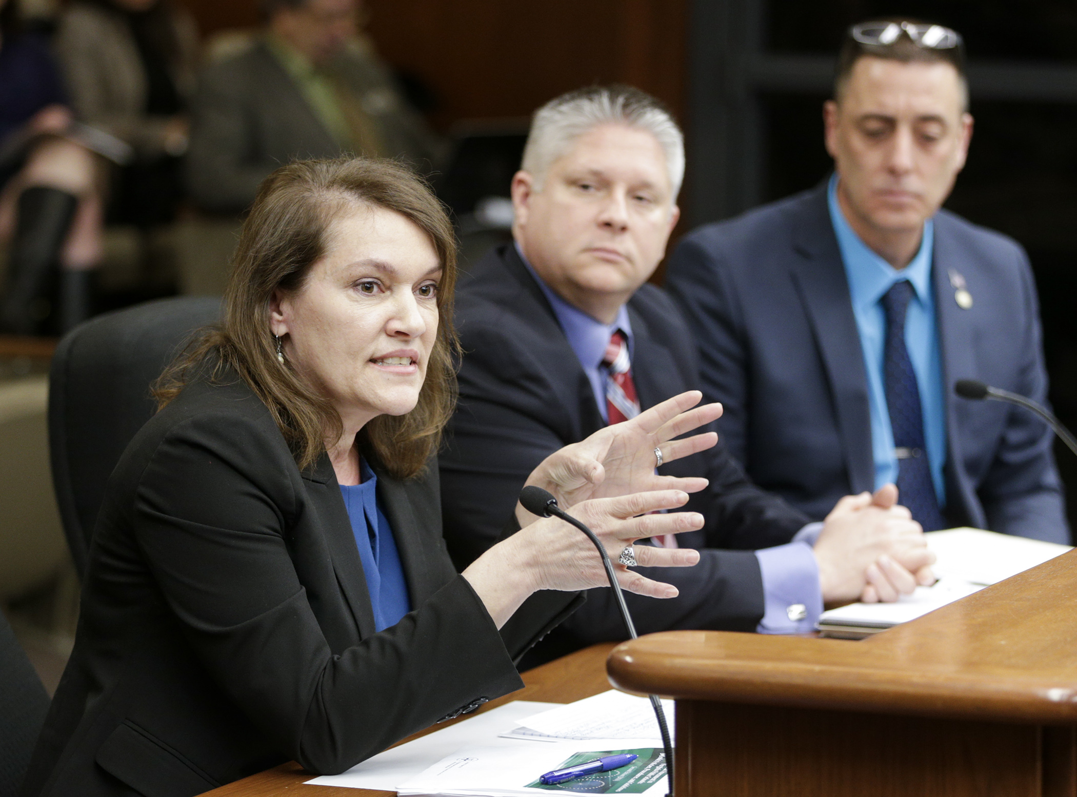 Threat assessment expert Kristine Kienlen testifies March 13 before the House Education Innovation Policy Committee on HF3370, sponsored by Rep. Keith Franke, right, requiring school districts to establish threat assessment teams. Photo by Paul Battaglia. 