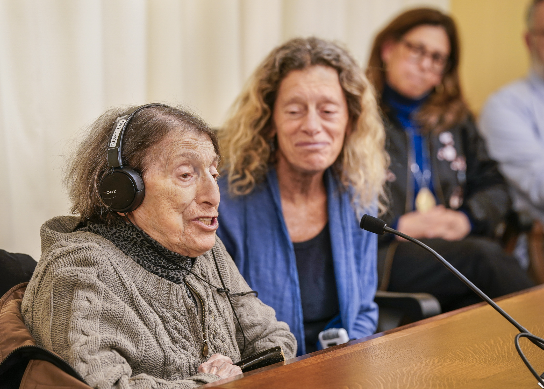 99-year-old Holocaust Survivor Dora Zaidenweber stresses the need for Holocaust and genocide education as she testifies in support of HF2685 before the House Education Policy Committee March 15. (Photo by Catherine Davis)