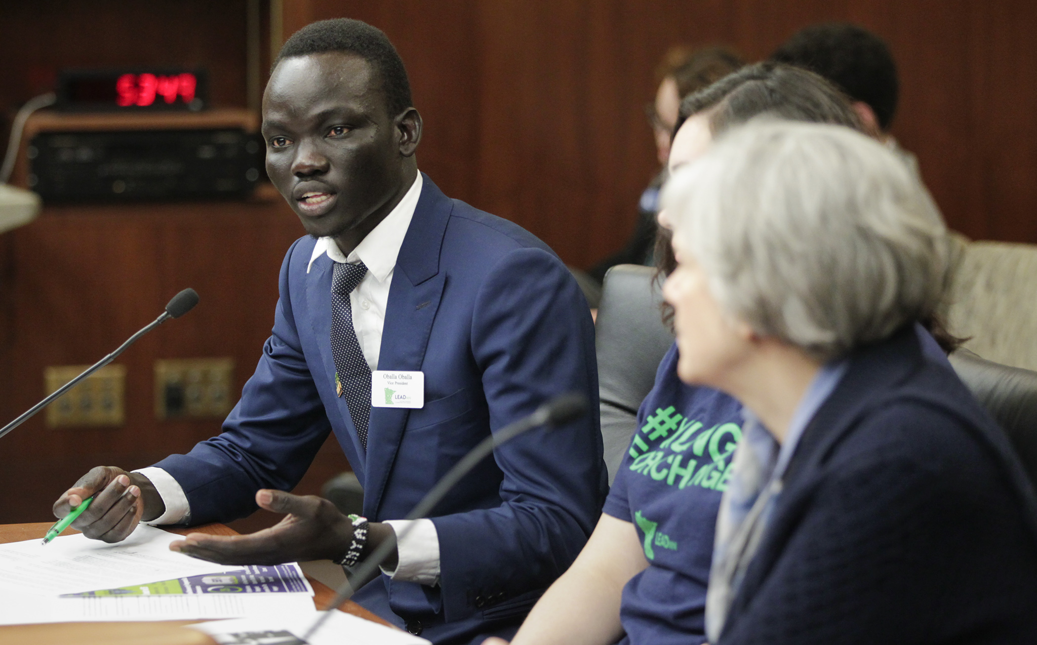 Oballa Oballa testifies before the House Higher Education Finance and Policy Division on HF2366, sponsored by Rep Laurie Pryor, right, which would establish the Hunger Free Campus Act and Hunger Free Campus designation requirements. Photo by Paul Battaglia