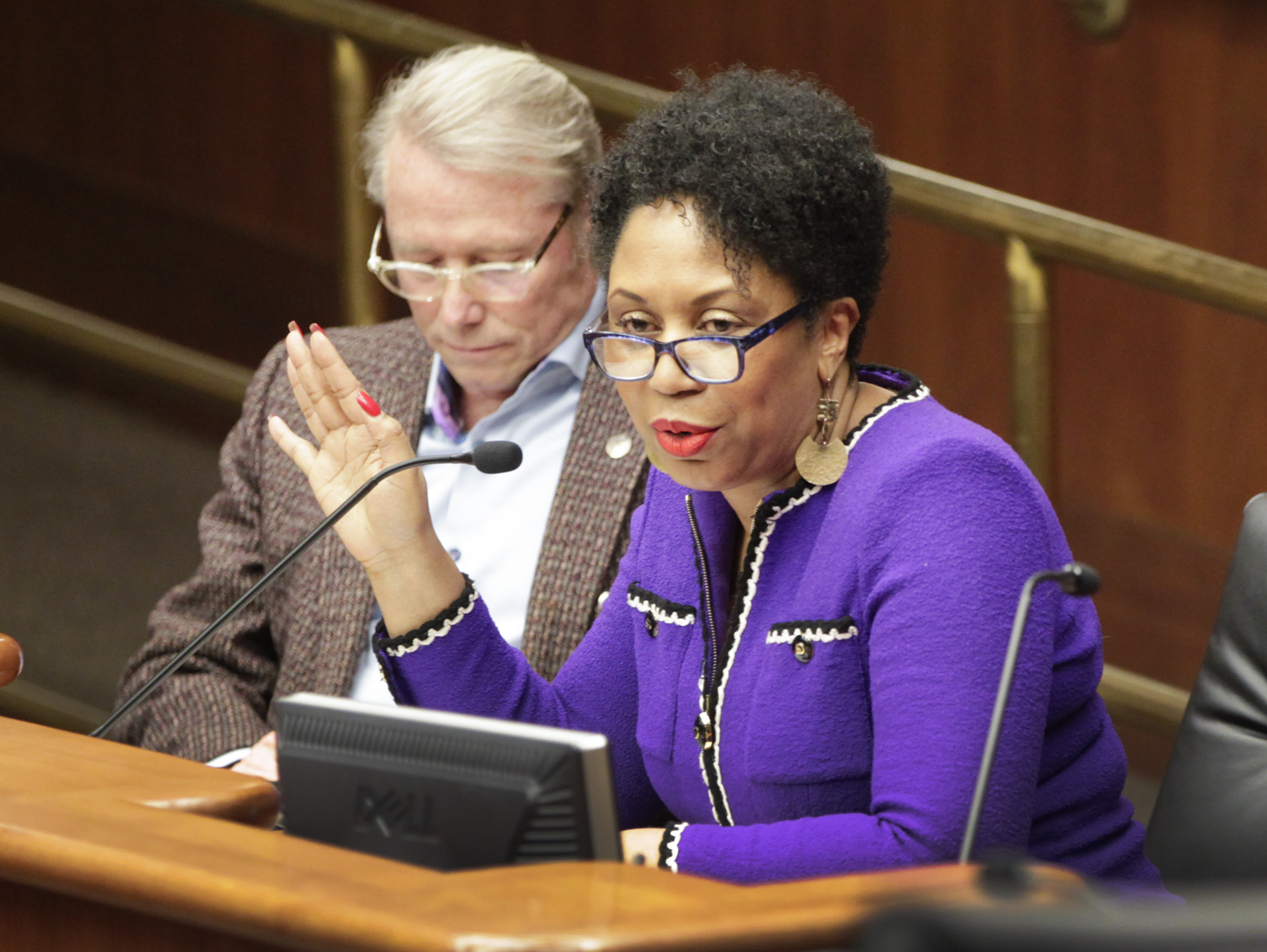 Sharon Smith-Akinsanya testifies in the House Legacy Finance Division in support of HF2360, sponsored by Rep. Raymond Dehn, left, which would appropriate $250,000 for a mural in Downtown Minneapolis honoring the life of Prince. Photo by Paul Battaglia