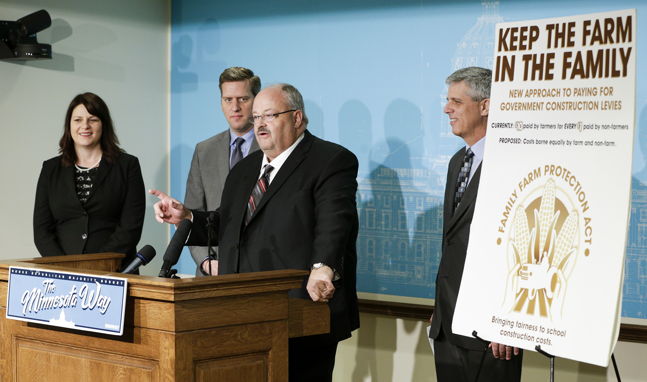 Rep. Greg Davids, center, chair of the House Taxes Committee, releases provisions of the House Republican omnibus tax bill at a March 22 news conference March 22. Pictured with him are House Majority Leader Joyce Peppin, from left, House Speaker Kurt Daudt and Rep. Steve Drazkowski, chair of the House Property Tax and Local Government Finance Division. Photo by Paul Battaglia