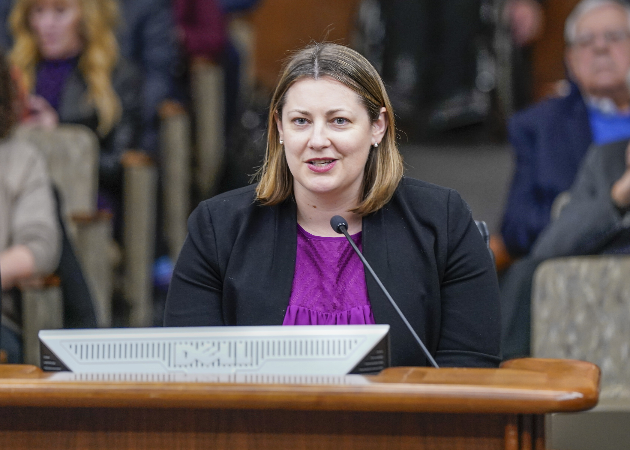 Commerce Commissioner Grace Arnold testifies before the House Commerce Finance and Policy Committee March 27 in support of HF2680, the committee’s omnibus bill. (Photo by Catherine Davis)