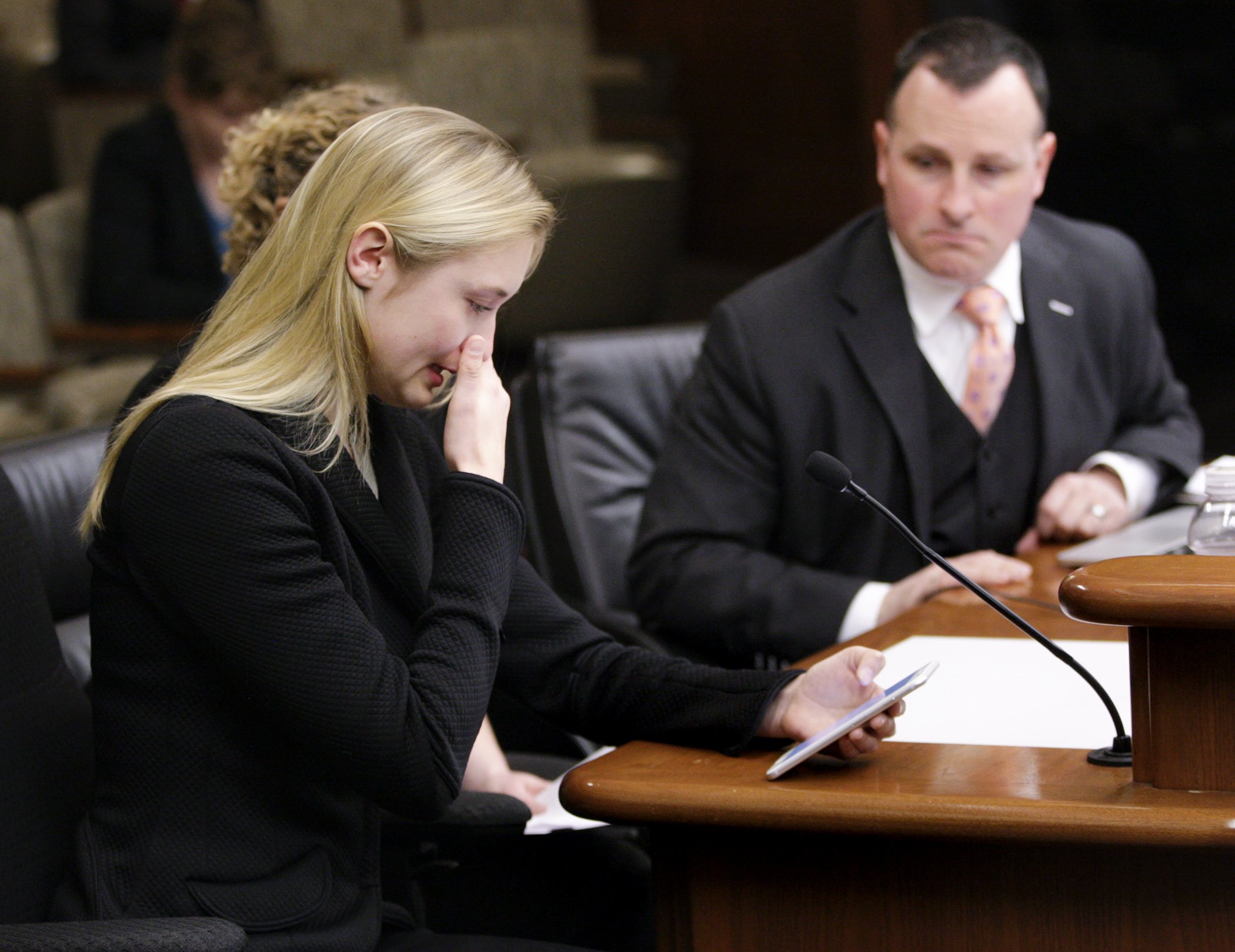 Elizabeth Williams, of Prior Lake, provides the House Public Safety and Crime Prevention Policy and Finance Committee with emotional testimony March 29, about her experience as a victim of “revenge porn.” Photo by Paul Battaglia