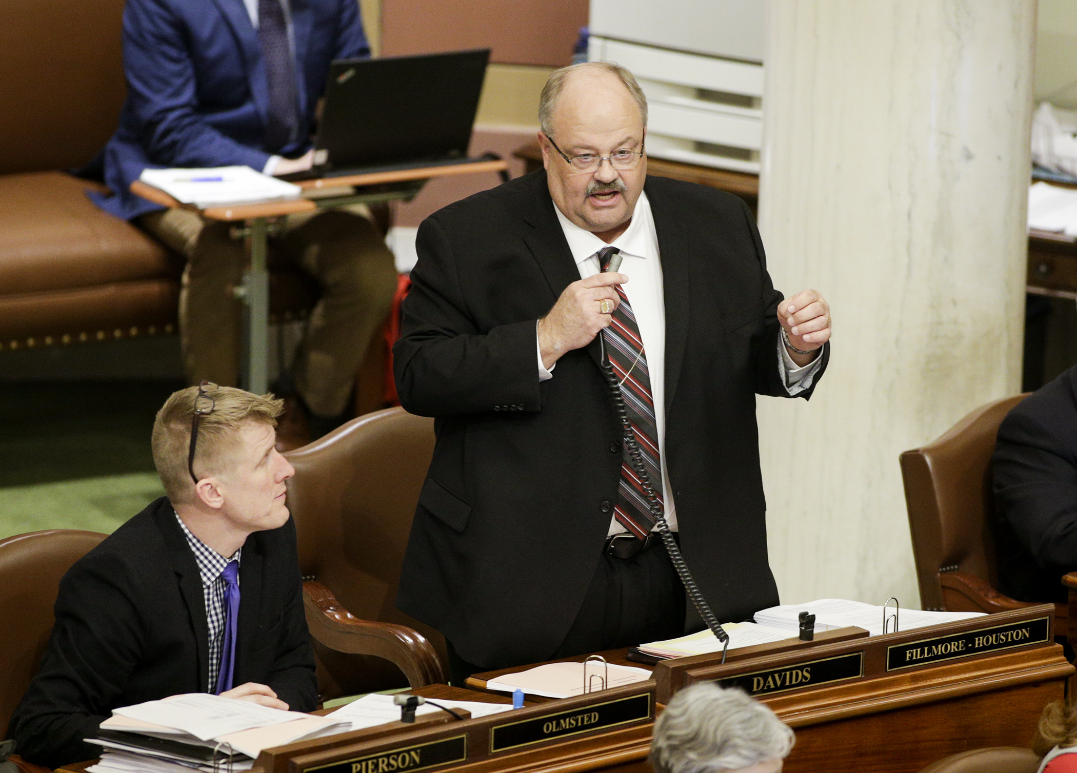 Rep. Greg Davids, chair of the House Taxes Committee, explains provisions of the omnibus tax bill during floor session March 30. Photo by Paul Battaglia