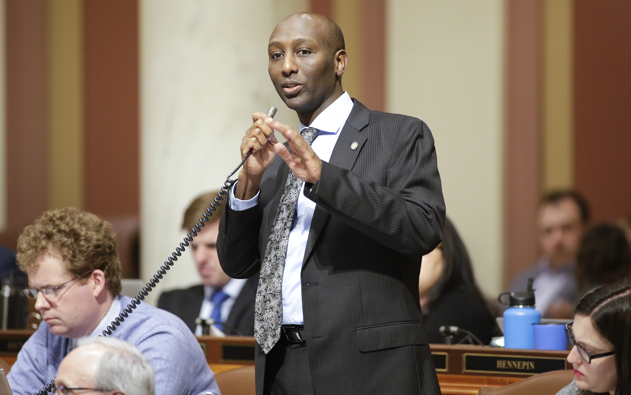 Rep. Mohamud Noor explains provisions of his bill, HF495, which would add new lease requirements to Minnesota law, during floor debate April 1. Photo by Paul Battaglia