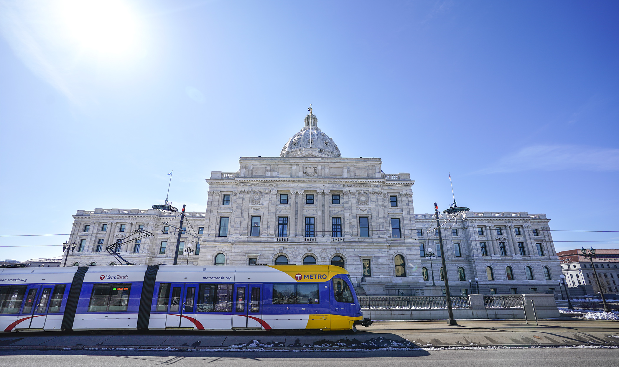 A Metro Transit Green Line train passes the State Capitol. (House Photography file photo)