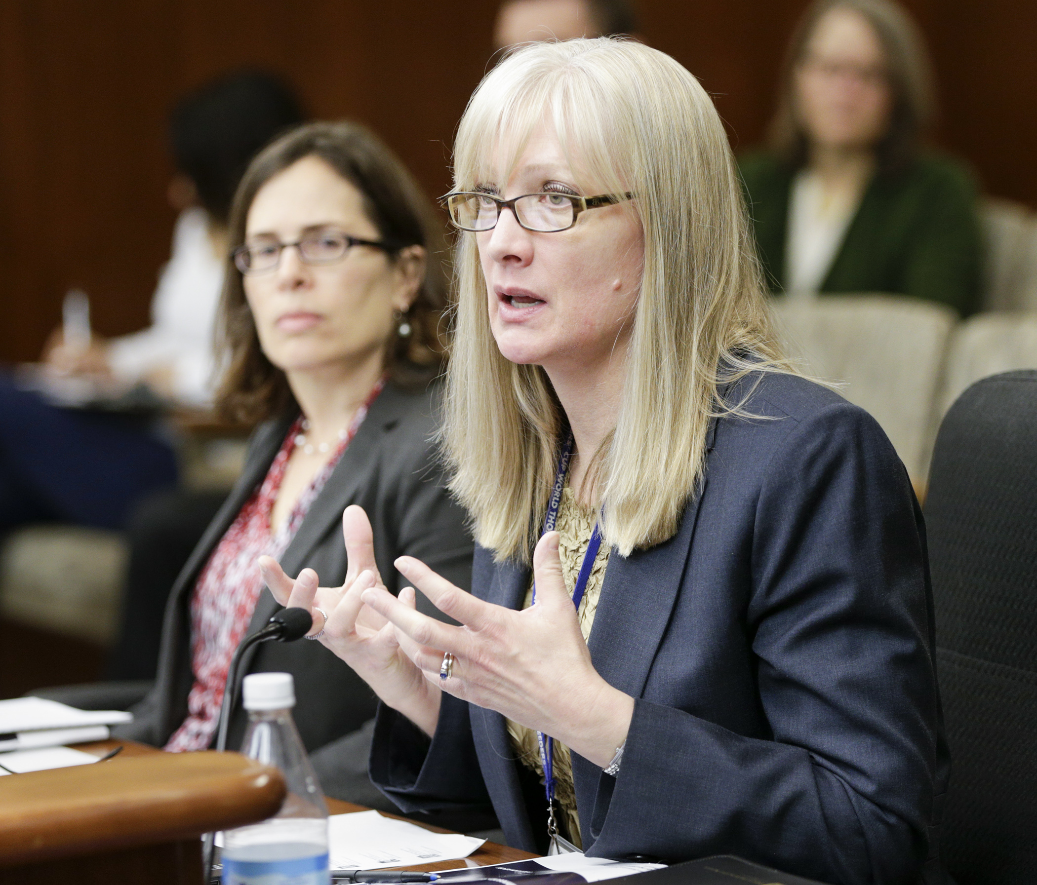 Valerie Bombach, program evaluator with the Office of the Legislative Auditor, answers a question during testimony before the House Education Innovation Committee April 4, regarding the OLA’s evaluation of the Minnesota State High School League. Photo by Paul Battaglia