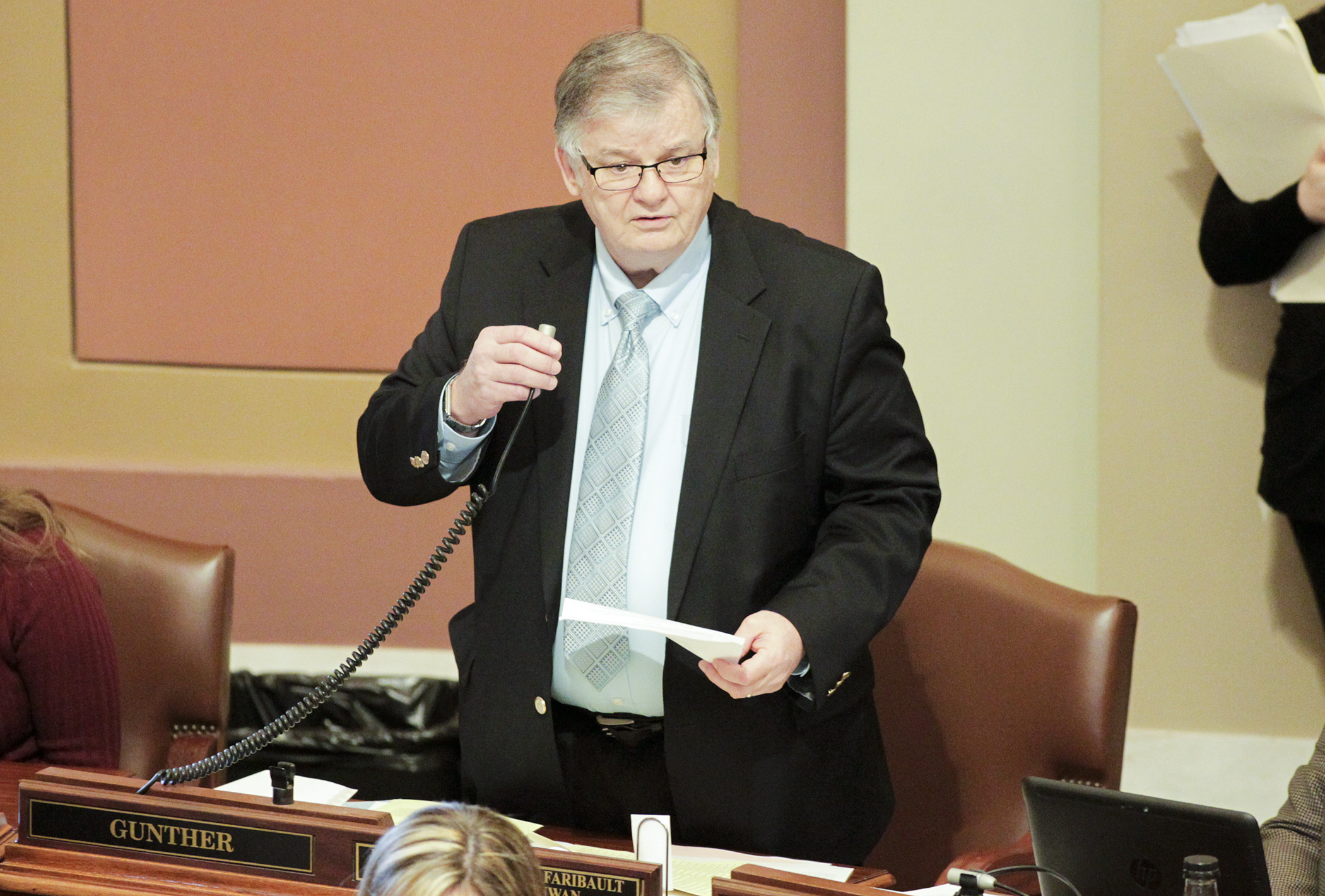 Rep. Bob Gunther, chair of the House Legacy Funding Finance Committee, describes provisions of the omnibus legacy funding bill during House Floor debate April 4. The bill passed 131-0. Photo by Paul Battaglia