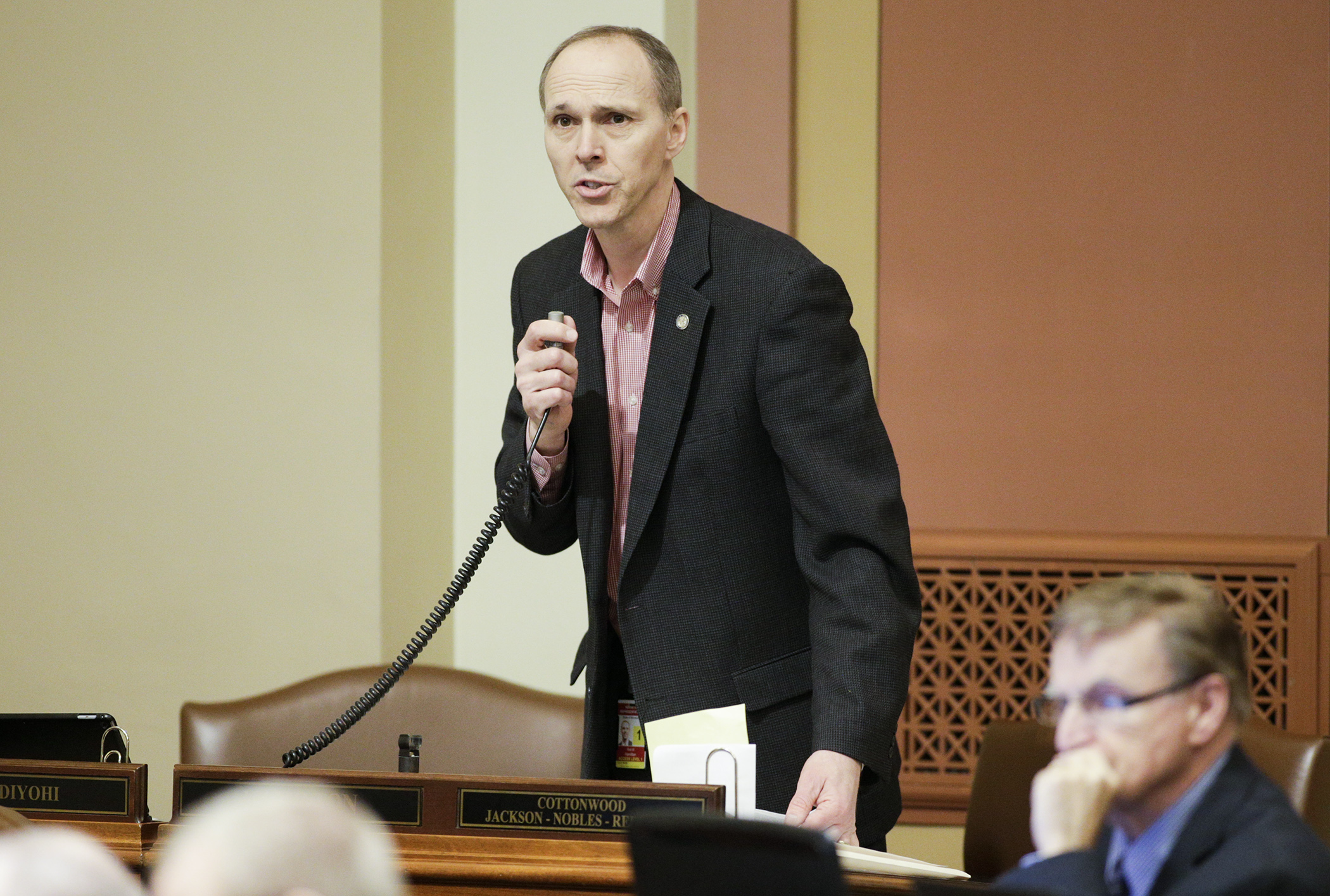 Rep. Rod Hamilton, chair of the House Agriculture Finance Committee, discusses provisions of the omnibus agriculture finance bill during House Floor debate April 5. The bill passed 134-0. Photo by Paul Battaglia