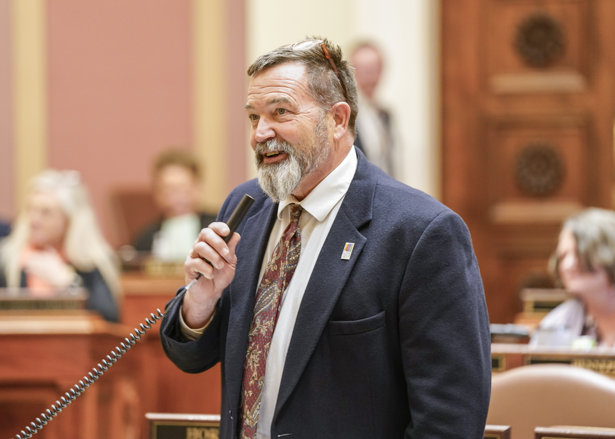 Rep. Leon Lillie introduces HF1999, the omnibus legacy finance bill, on the House Floor April 12. It was passed 69-59. (Photo by Catherine Davis)