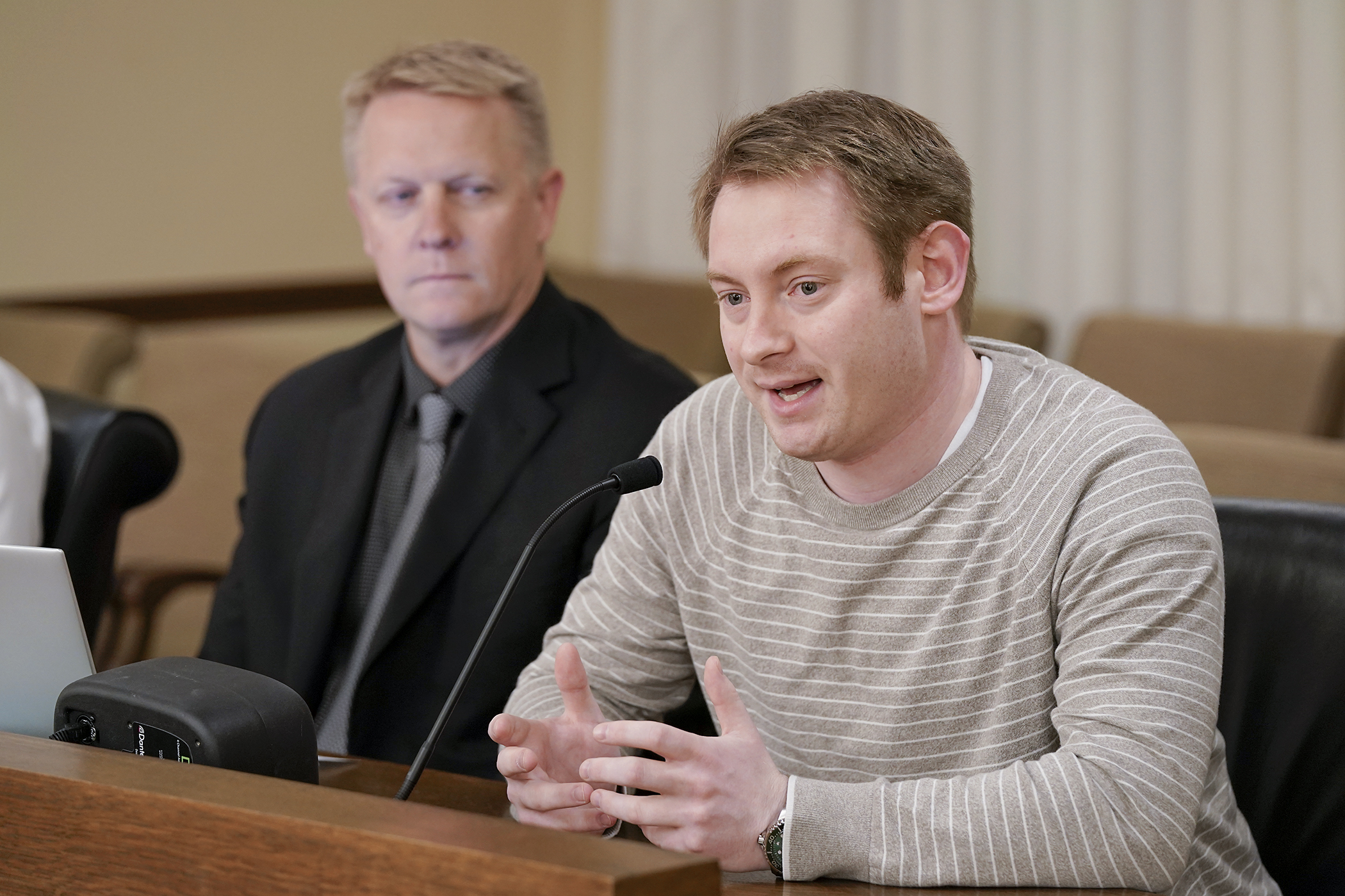 Brendan Weed, a doctoral candidate in clinical psychology at Augsburg University, testifies Wednesday in support of HF4588. Sponsored by Rep. Andrew Myers, HF4588 would establish a task force to improve veterans' access to mental health services in rural areas. (Photo by Michele Jokinen)